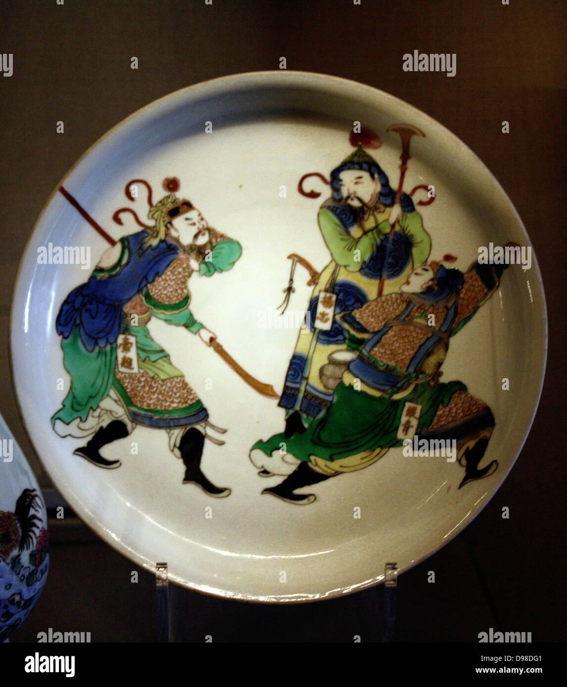 Dish with figures from the novel Shuihu zhuan (The Water Margin), porcelain with overglaze famille verte enamels, Jingdeshen kilns, Jiangxi province, 1680-1720. Stock Photo