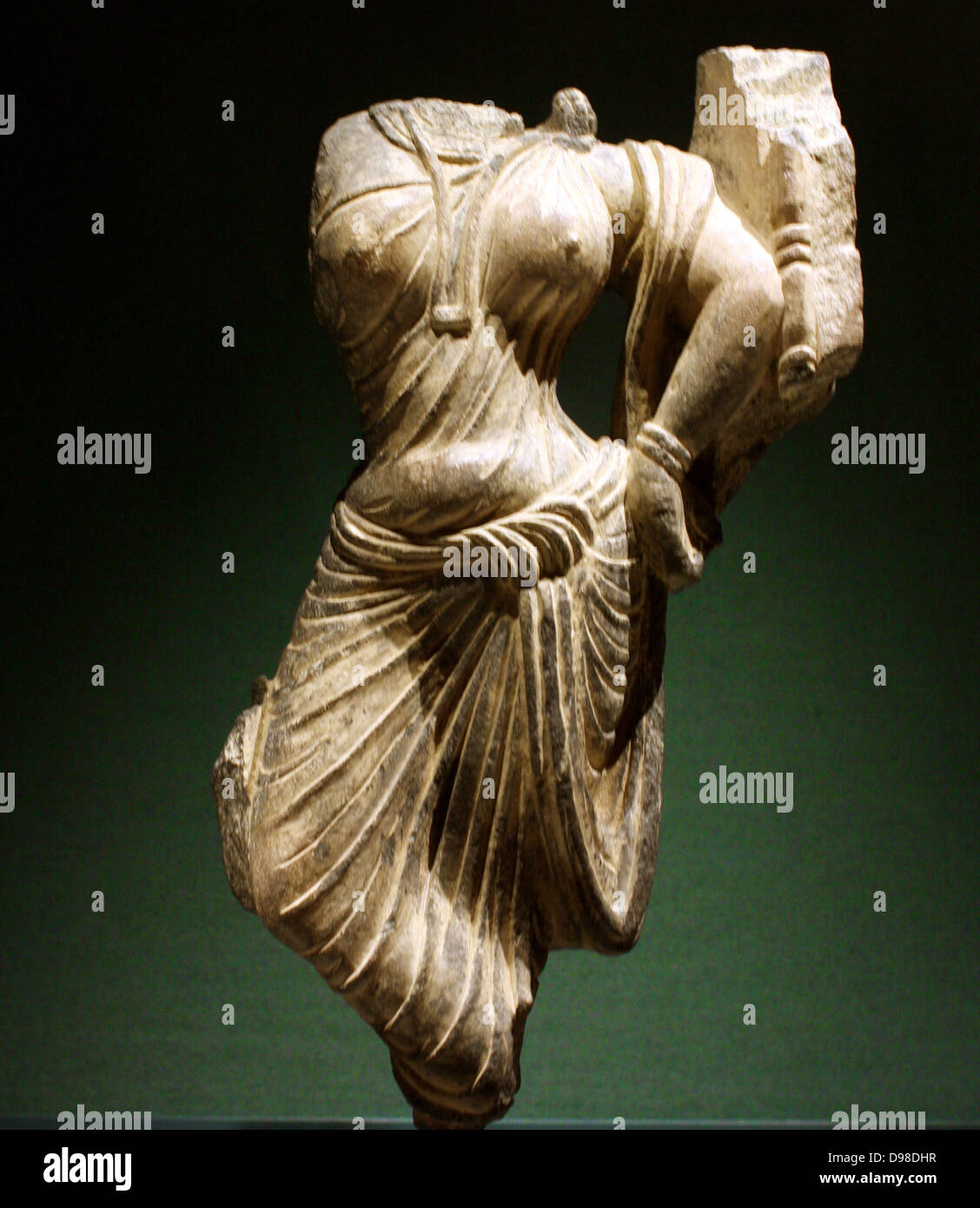 Female figure, Gandhara, AD 100-200.  Schist relief fragment. Stock Photo