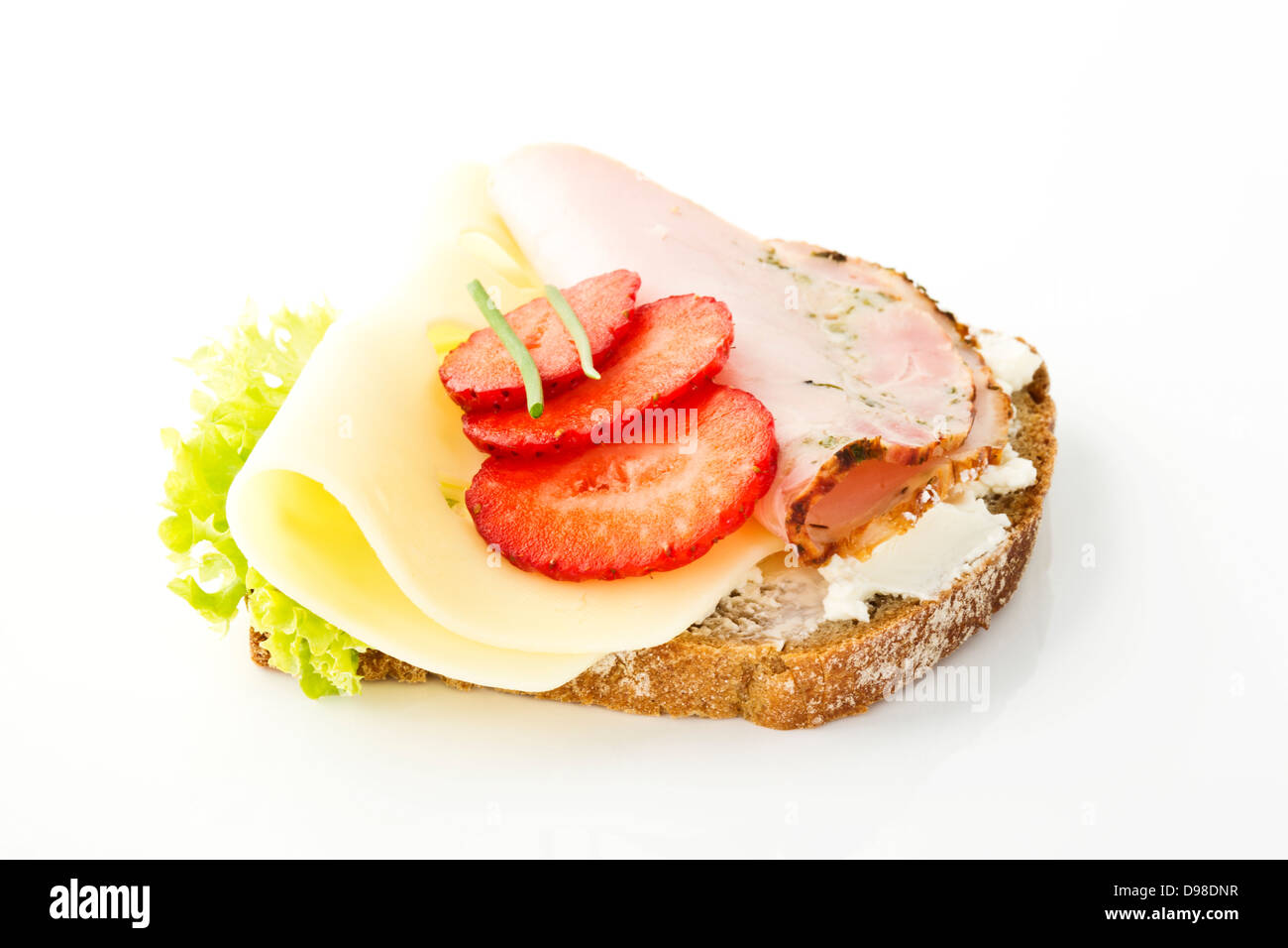 Fitness sandwich with cream cheese, salad, cheese and ham on white ...