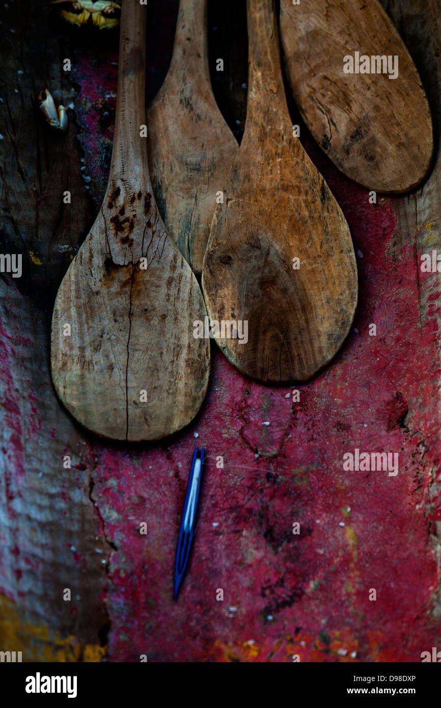 Canoe paddles with fishing line on a hut on Fadiouth Island, Senegal Stock Photo