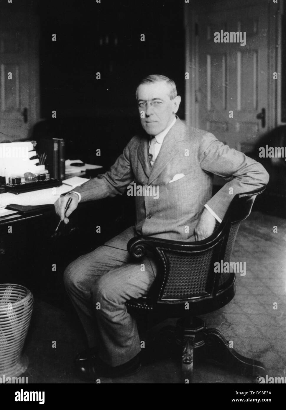 (Thomas) Woodrow Wilson (1856-1924) 28th President of the United States of America 1913-1921 throughout the First World War. Suffered a severe stroke in October 1919 leaving him partially incapacitated. Woodrow at his desk. Stock Photo