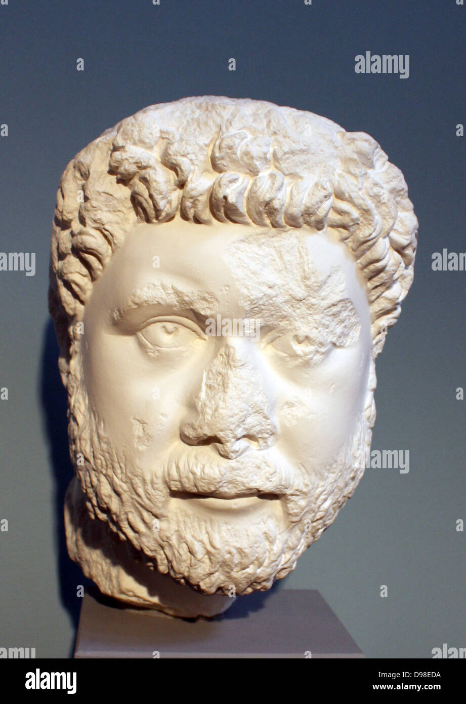 Governor Oecumenius.  From North Agora at Aphrodisias, c. AD 400.  The head belongs to a statue whose inscribed base praises the governor's knowledge of the law, his ability to speak both Greek and Latin, and his purity of mind and hand.  On top of the head, a Christian sculptor covertly marked his faith in three inscribed letters :XMG - Christon Maria genna, 'Christ was born to Mary'. Stock Photo