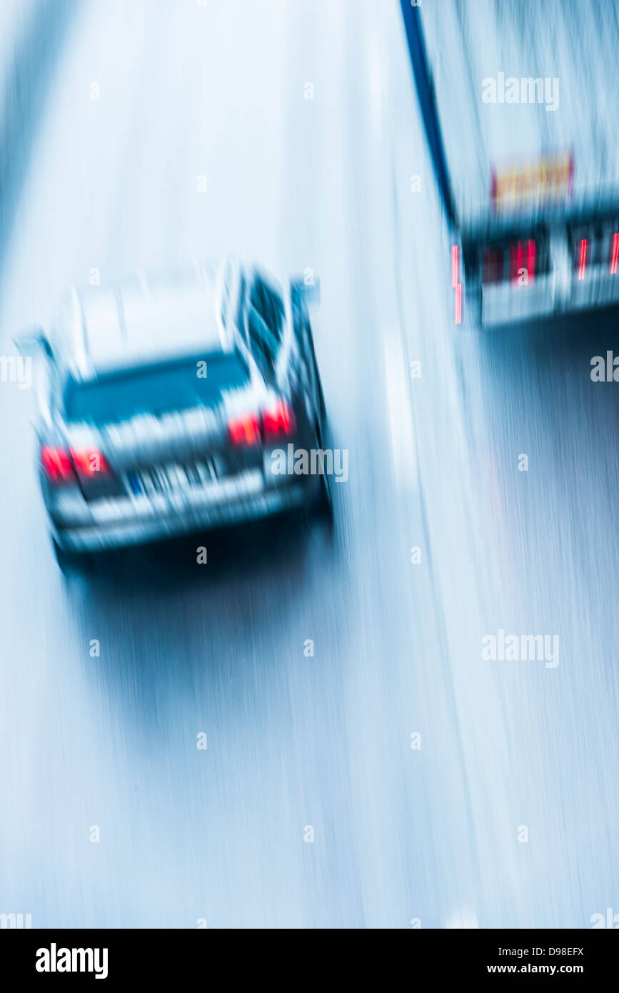 Blurred motion of car and truck on freeway in Stockholm, Sweden Stock Photo