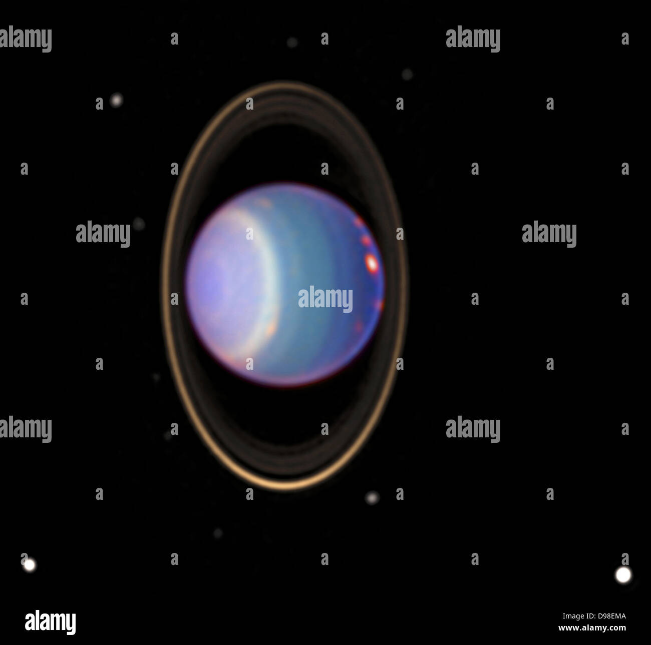 A recent Hubble Space Telescope (HST) view reveals Uranus surrounded by its 4 major rings and 10 of its 17 known satellites Stock Photo