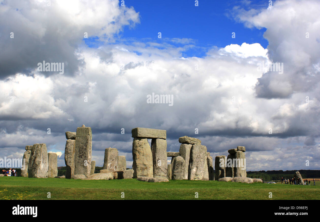 Stonehenge is a prehistoric monument located in the English county of Wiltshire, one of the most famous sites in the world.  It is composed of earthworks surrounding a circular setting of large standing stones.  It is the centre of the most dense complex of Neolithic and Bronze Age monuments in England, including several hundred burial mounts. Stock Photo