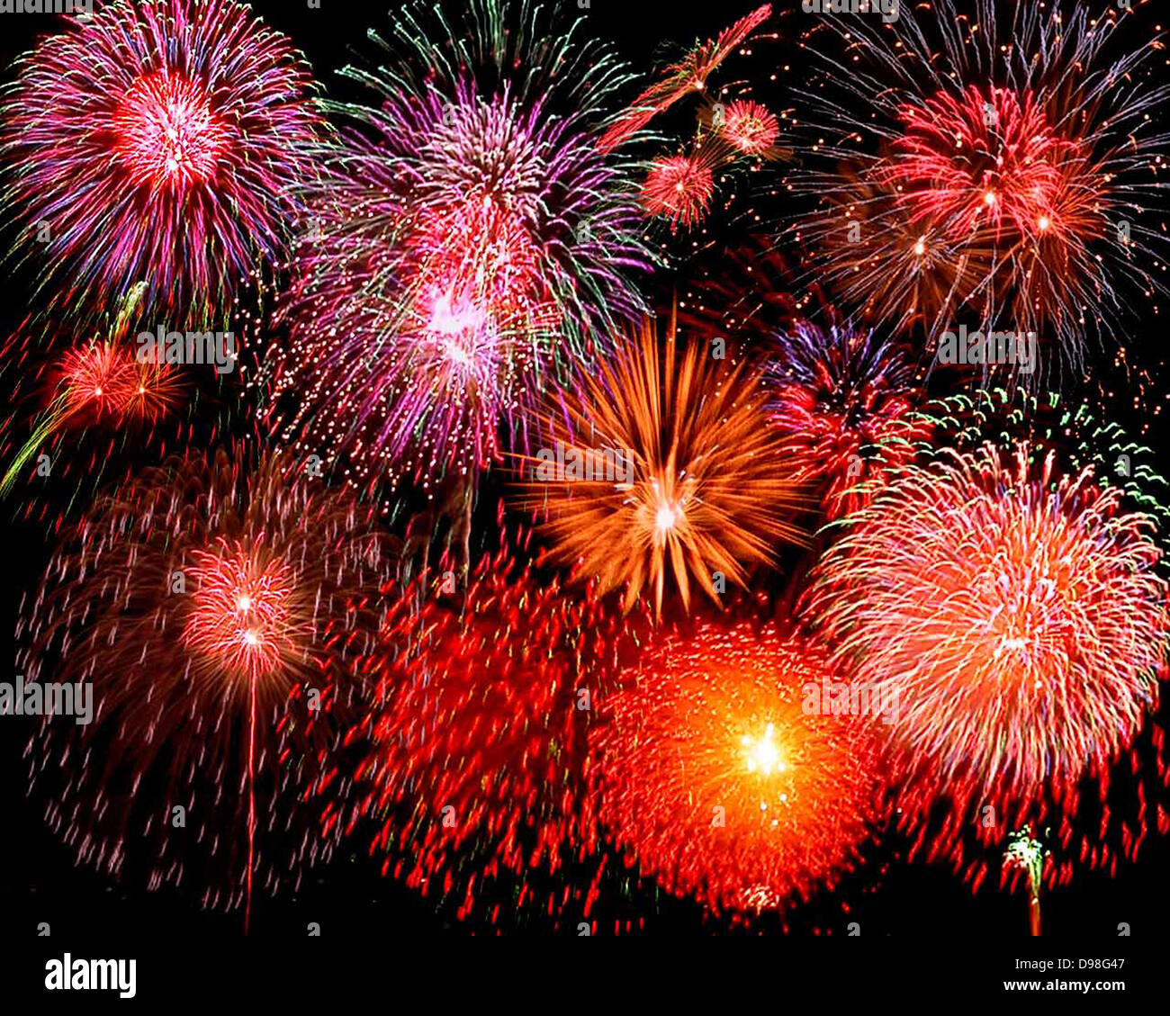 fireworks explode across a night sky Stock Photo Alamy