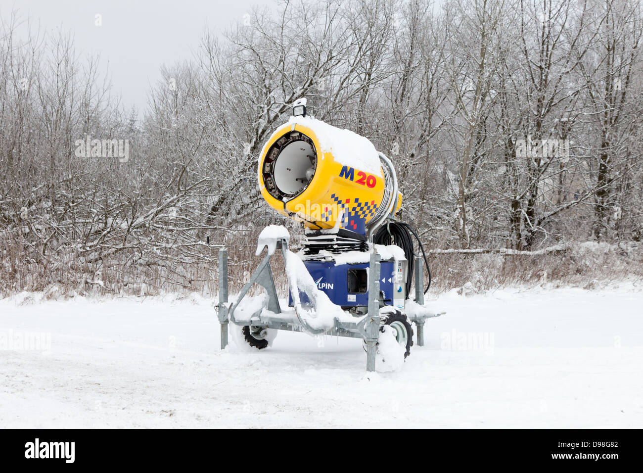 M20 Snow cannon standing idle covered in snow Stock Photo Alamy