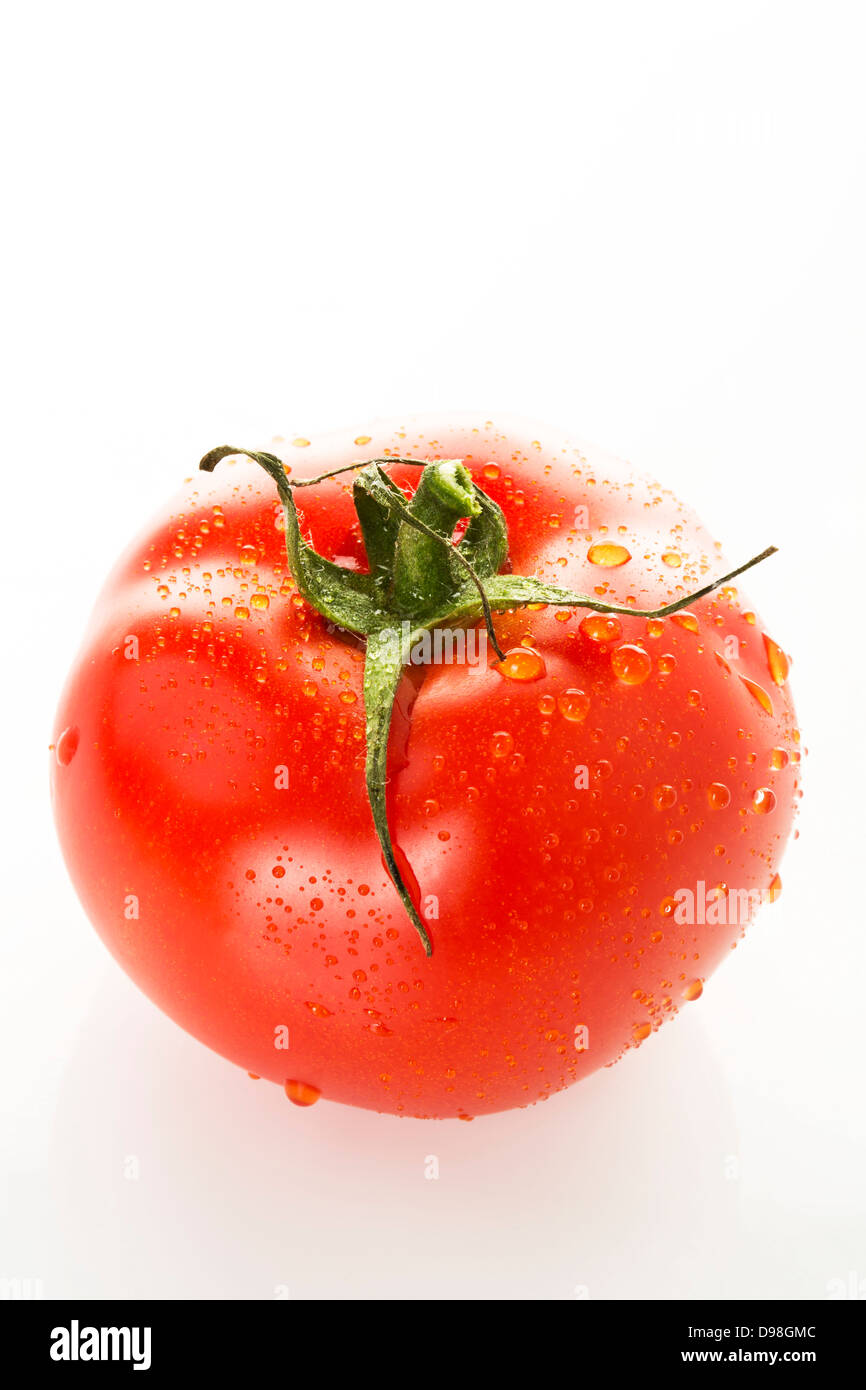 Tomato on white background, close up Stock Photo - Alamy