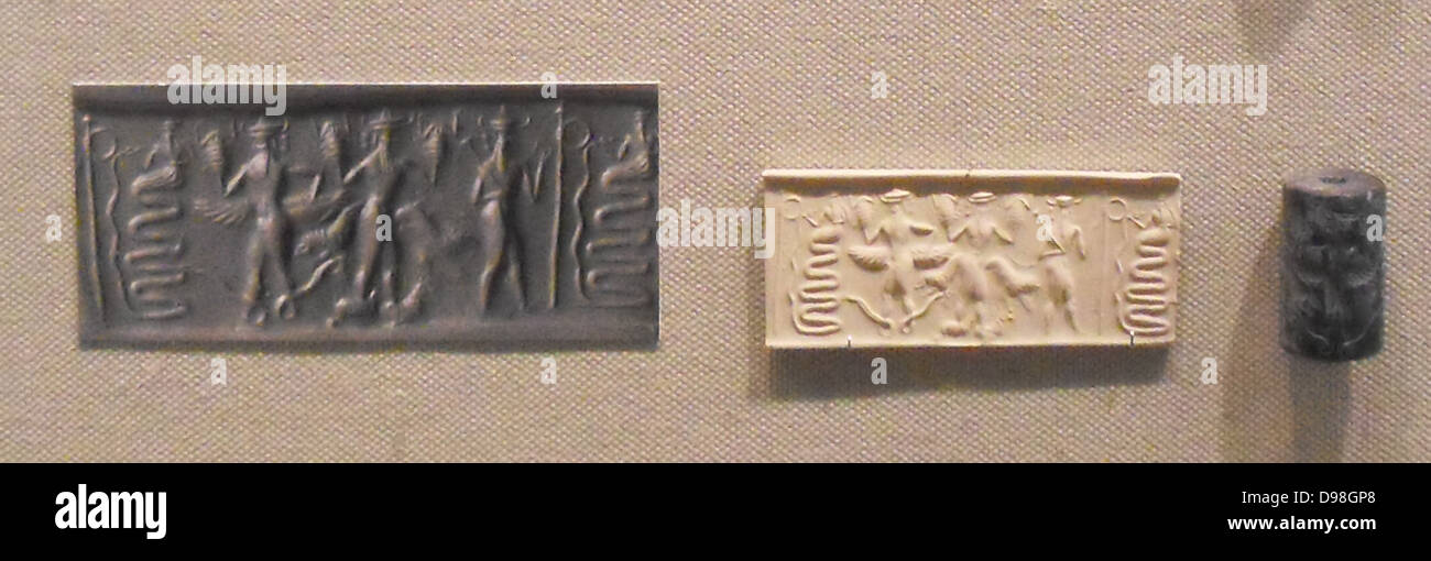 Cylinder seal with impressions, from Mesopotamia. seal made from metadiorite, depicting a snake god and other deities with snake, scorpion and goat features. Akkadian Period, 2350-2150 BC. Stock Photo