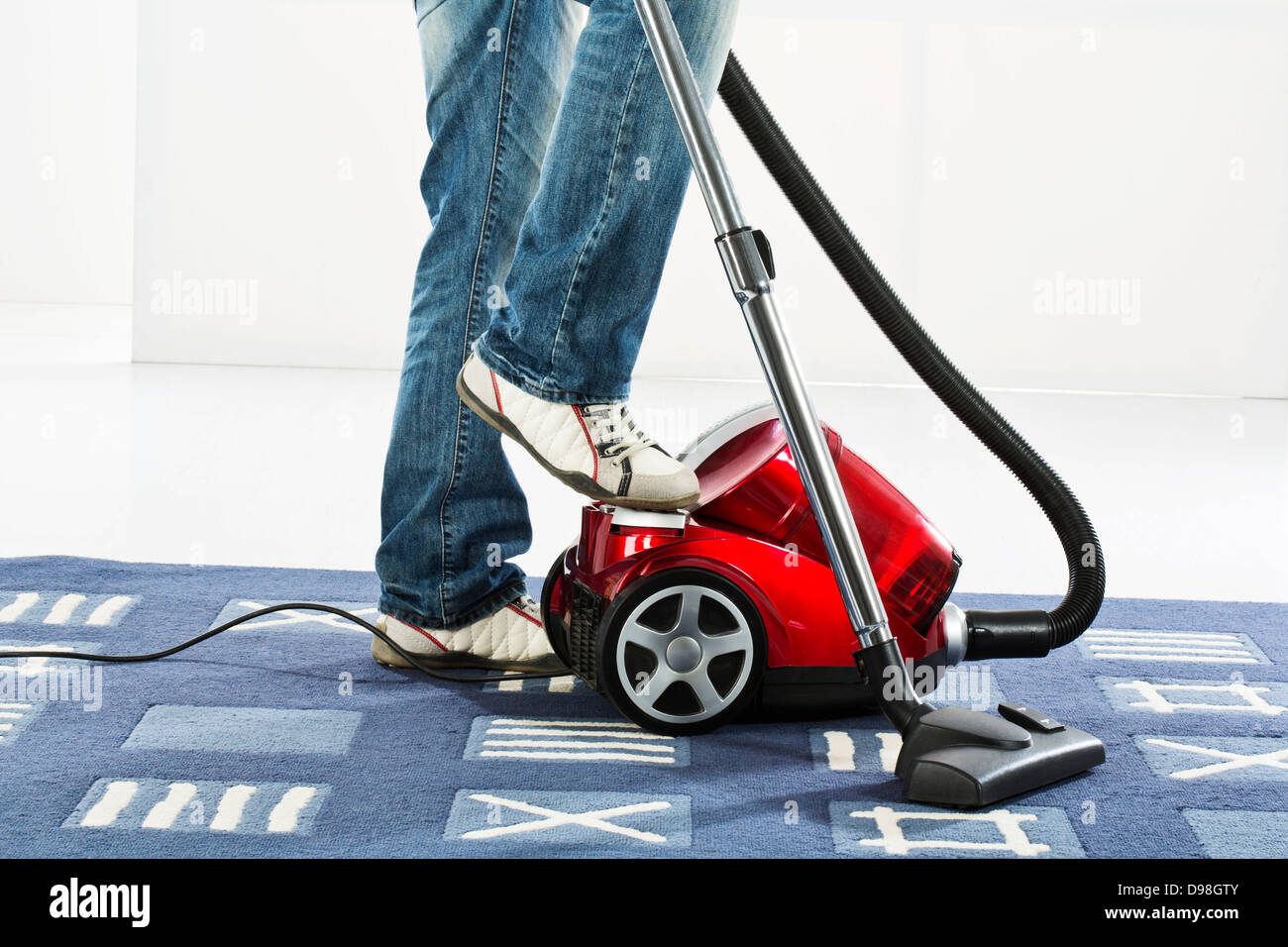 Man hoovering not woman hi-res stock 