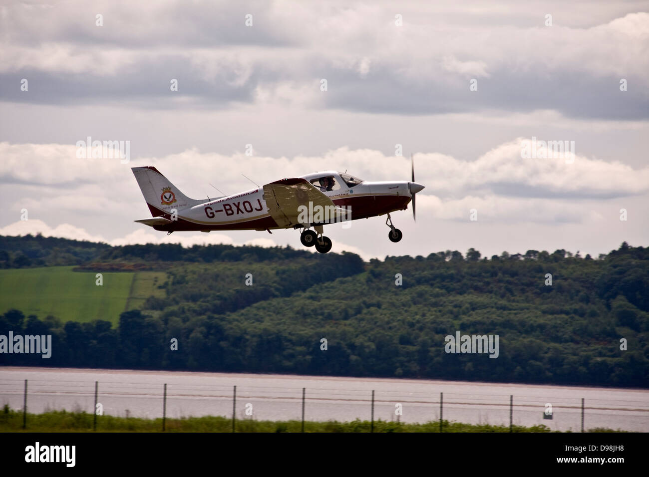 The Tayside Aviation G-BXOJ Training aircraft taking off from Dundee Airport, UK Stock Photo