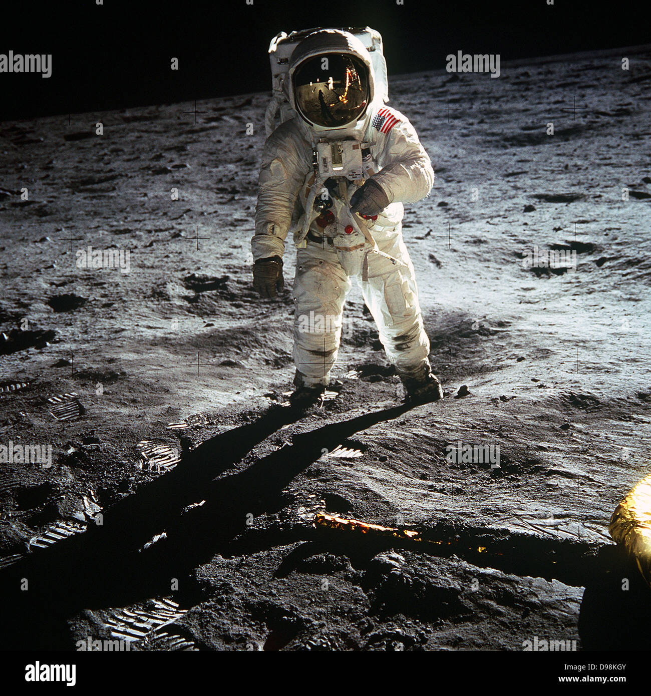 Astronaut Buzz Aldrin walks on the surface of the moon near the leg of the lunar module Eagle during the Apollo 11 mission. Mission commander Neil Armstrong took this photograph with a 70mm lunar surface camera. While astronauts Armstrong and Aldrin explored the Sea of Tranquillity region of the moon, astronaut Michael Collin remained with the command and service modules in lunar orbit Stock Photo