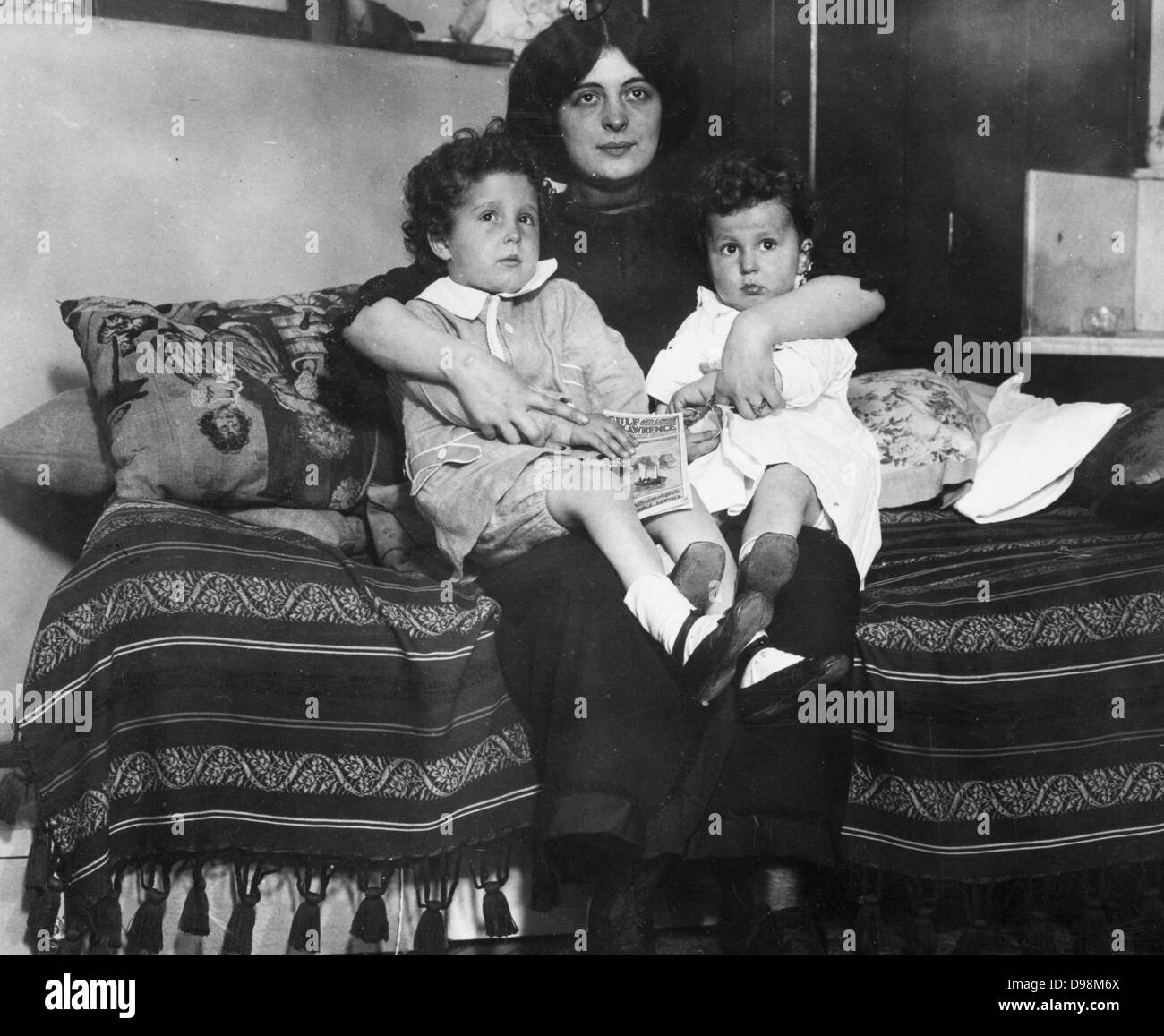 Survivors of the Titanic disaster 1912. Louis and Michel Navratil, of Nice, France, on their mother's lap. Stock Photo