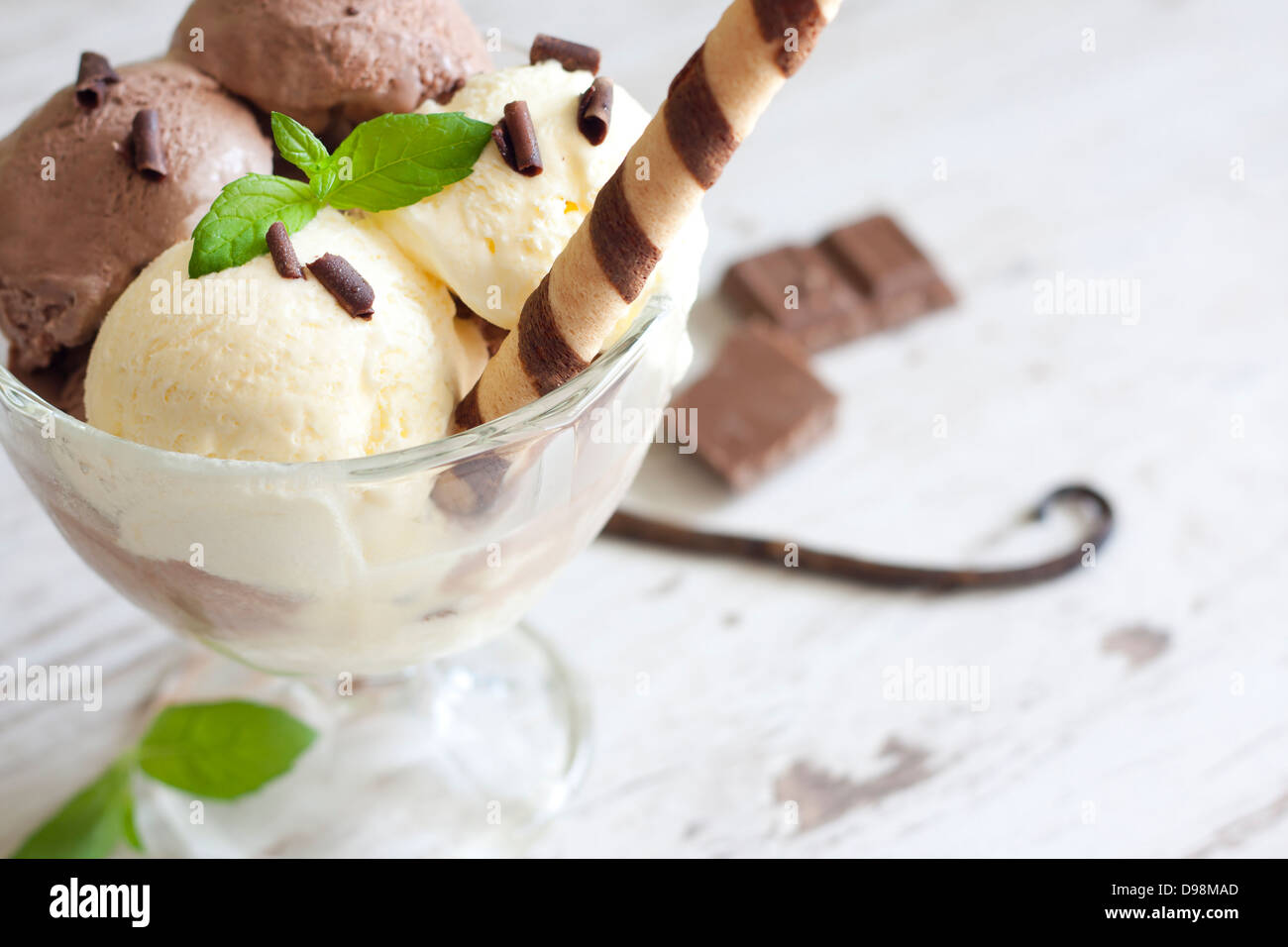 Ice cream vanilla and chocolate on retro table closeup Stock Photo