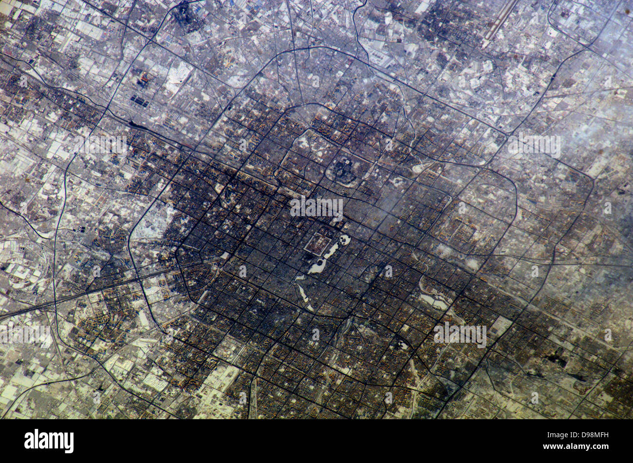 2005 The large city Beijing (Peking), China is featured in this image photographed by Expedition 10 Commander Leroy Chiao on the International Space Station. Stock Photo