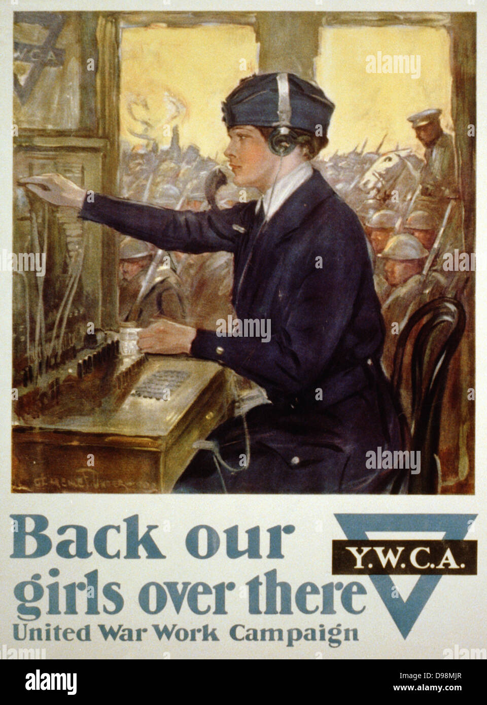 Back our girls over there United War Work Campaign by Clarence F. Underwood.  [1918] Y.W.C.A. poster for the United War Work Campaign showing a young woman seated at a switchboard with soldiers in the background. Young Women's Christian Association, World War I poster. Stock Photo