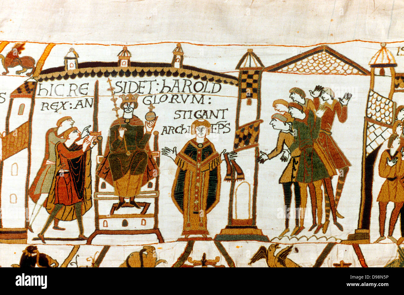 Bayeux Tapestry 1067. Harold II crowned King of England, 6 January 1066. Harold enthroned holding orb and sceptre, Archbishop Stigand on his right. Anglo-Saxon Coronation Ceremony Christian Textile Embroidery Linen Stock Photo