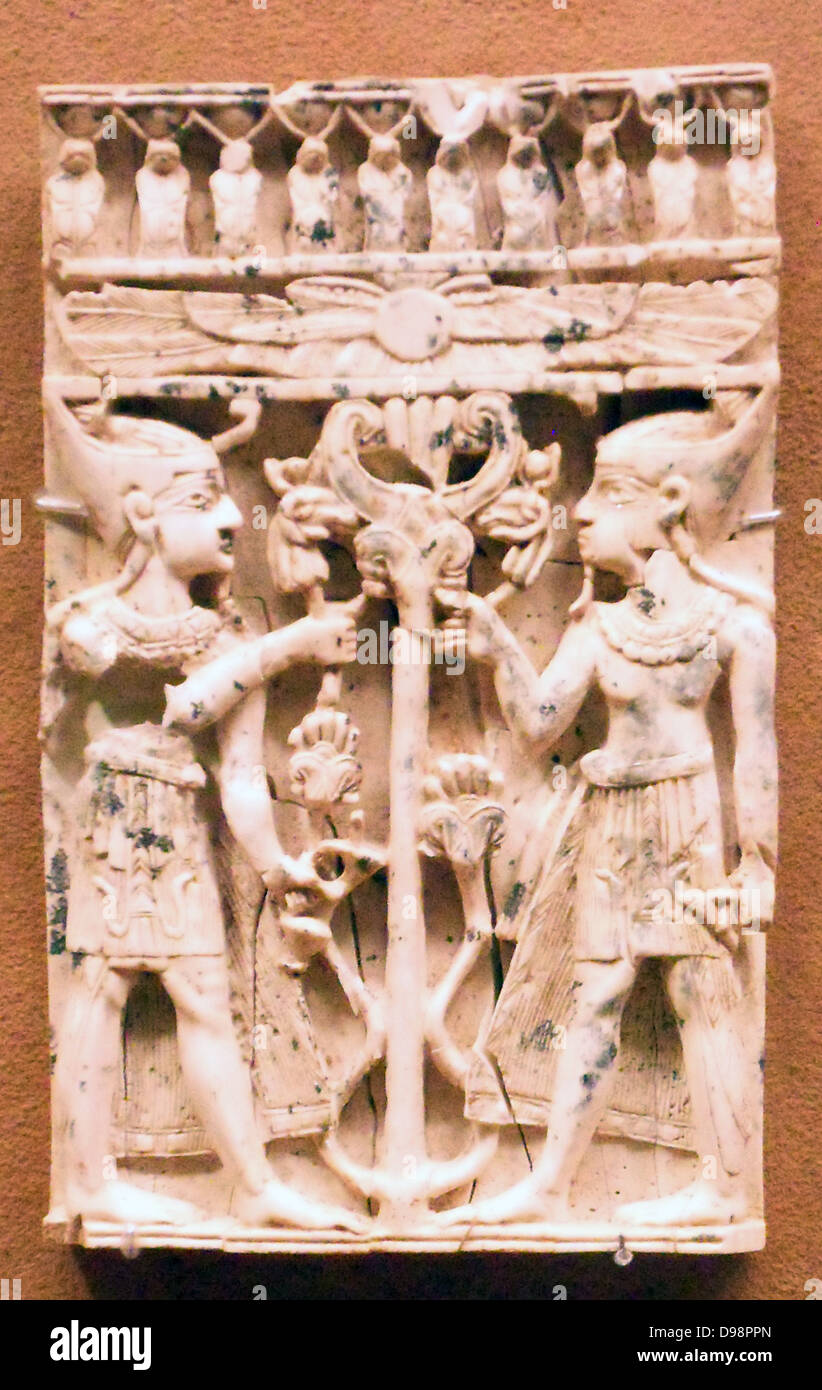Ivory plaque with pharaonic figures flanking a sacred tree Art. Neo-Assyrian, ca. 9th–8th century B.C. Excavated by Sir Max Mallowan Stock Photo
