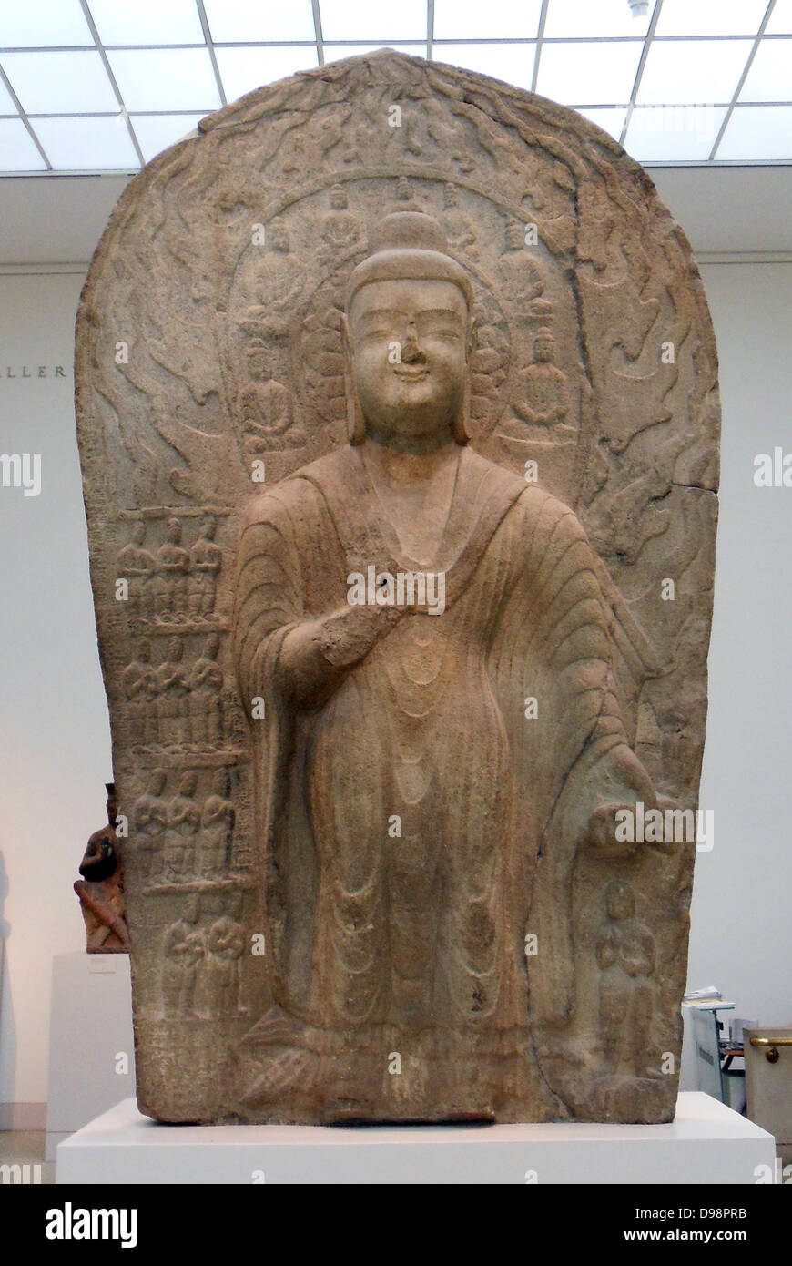 Stele with Buddha Dipankara (Randeng) China. Northern Wei dynasty (386–534) dated 489–95. Sandstone with traces of pigment Stock Photo