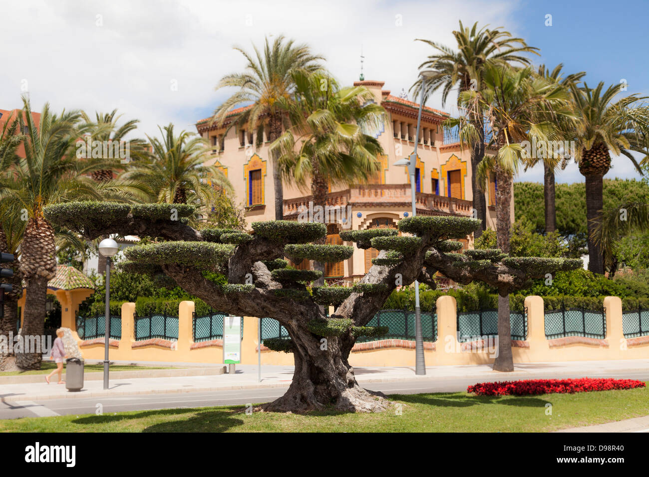 topiary tree and xalet bonet built by Ciriac Bonet late modernism architecture at Salou Spain Stock Photo