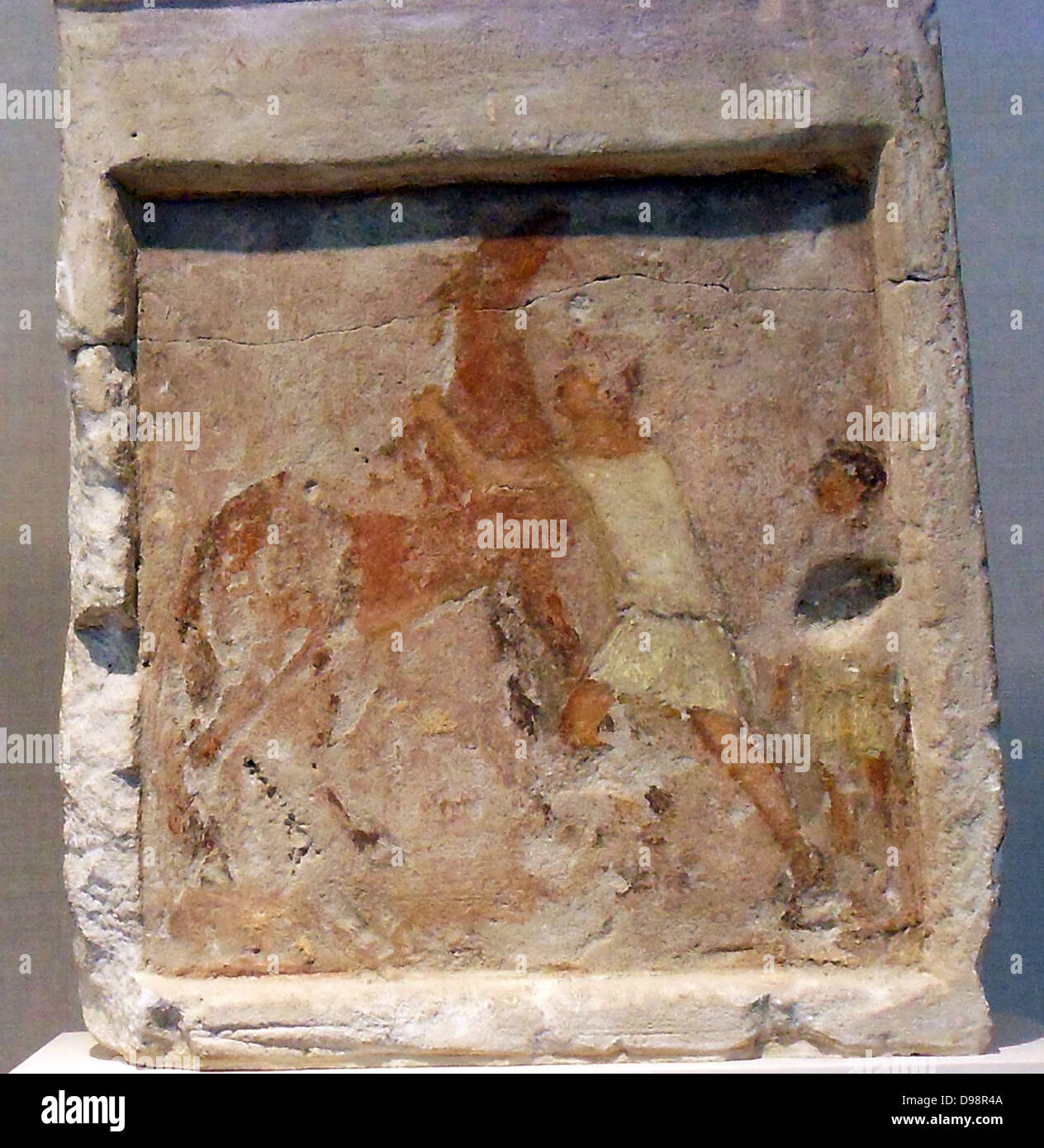 Painted limestone funerary slab with a man controlling a rearing horse. Greek, Hellenistic 2nd half of 3rd century B.C. Stock Photo