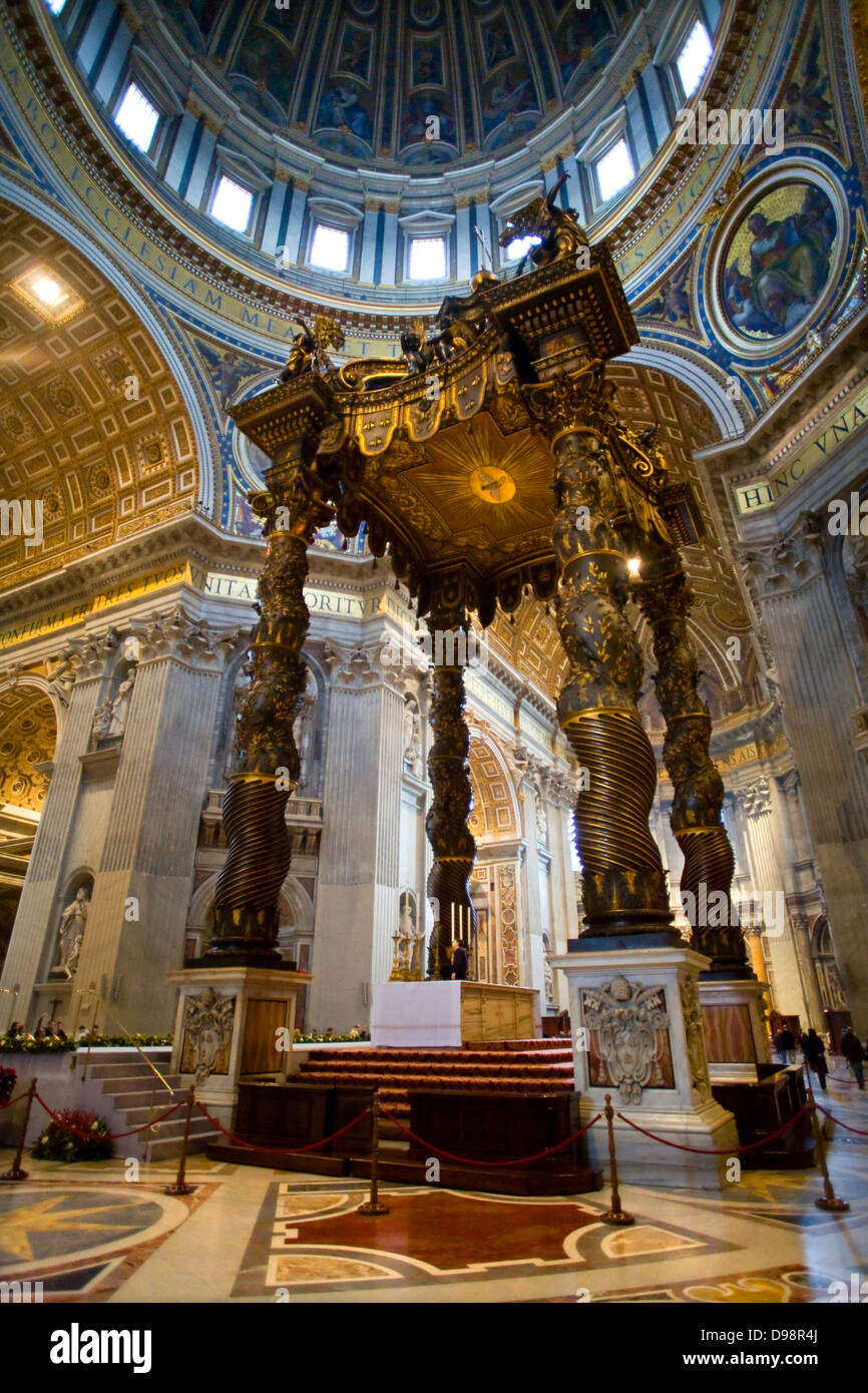 The altar with Bernini´s baldachin. Papal Basilica of Saint Peter , or St Peter´s Basilica, Vatican City, Rome, Italy, Europe Stock Photo