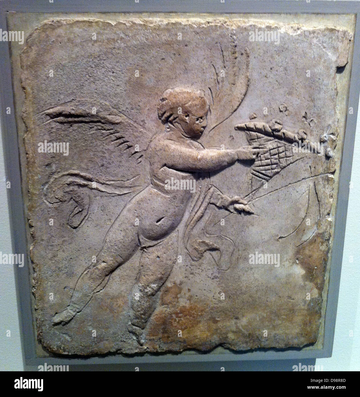 Stucco relief (Roman) depicting Eros. 1st Century AD Stock Photo