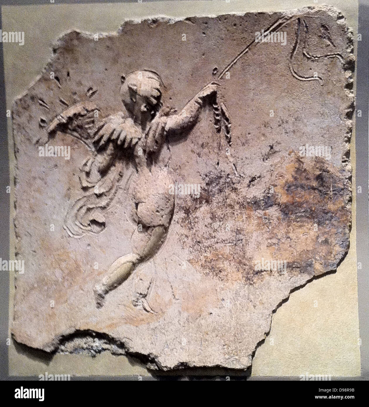 Stucco relief (Roman) depicting Eros. 1st Century AD Stock Photo - Alamy