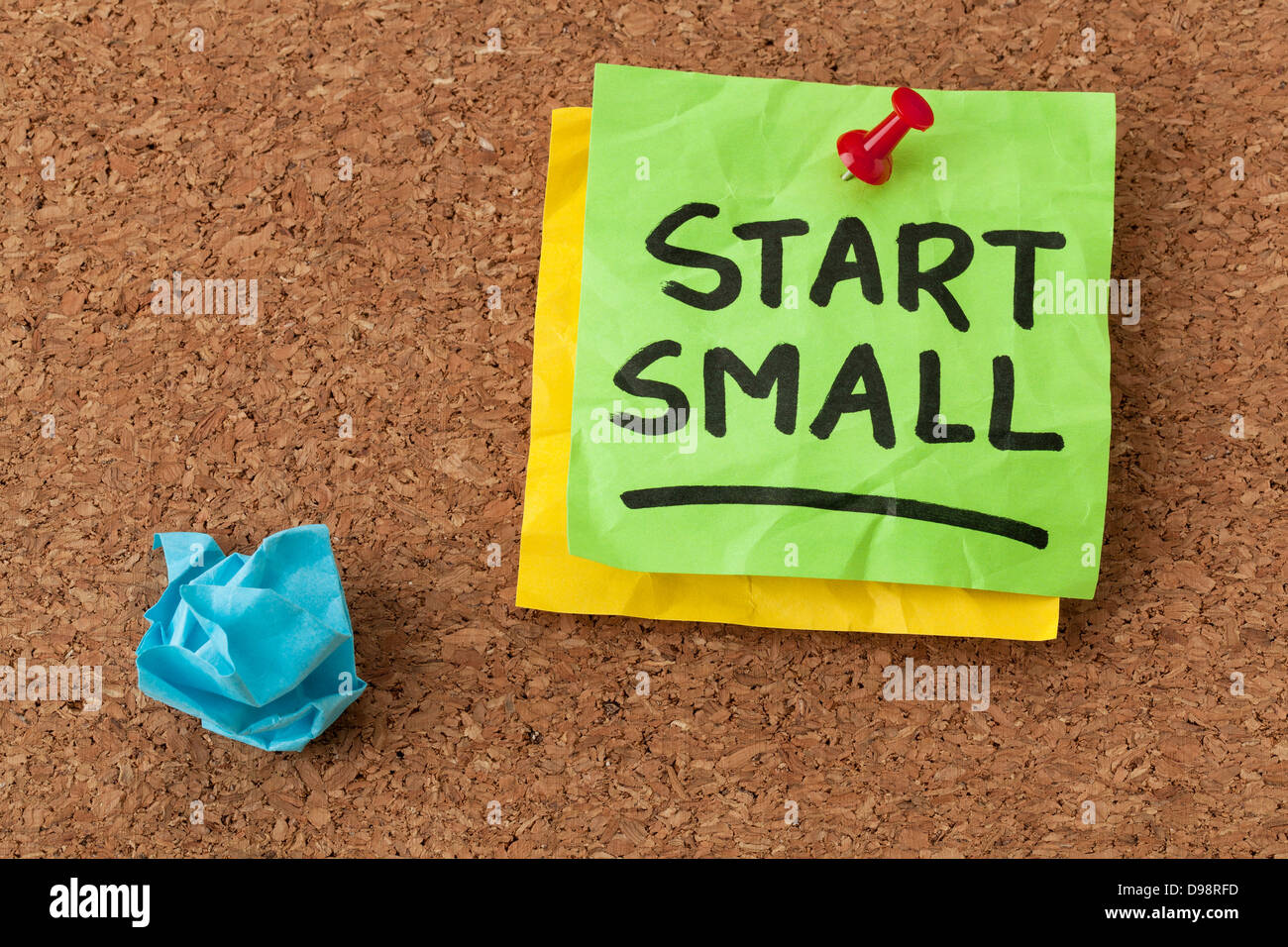 start small - business advice - handwriting on green sticky note Stock Photo