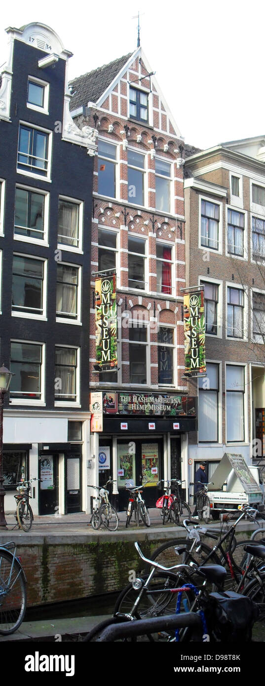 Typical canal street scene in Amsterdam, Holland. Mariujana museum Stock Photo