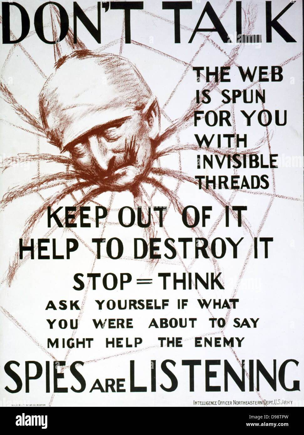 World War I 1914-1918: ' Don't talk, the web is spun for you with invisible threads, keep out of it, help to destroy it--spies are listening.1918 USA propaganda poster showing the head of Kaiser Wilhelm II as spider. Anti-German Stock Photo