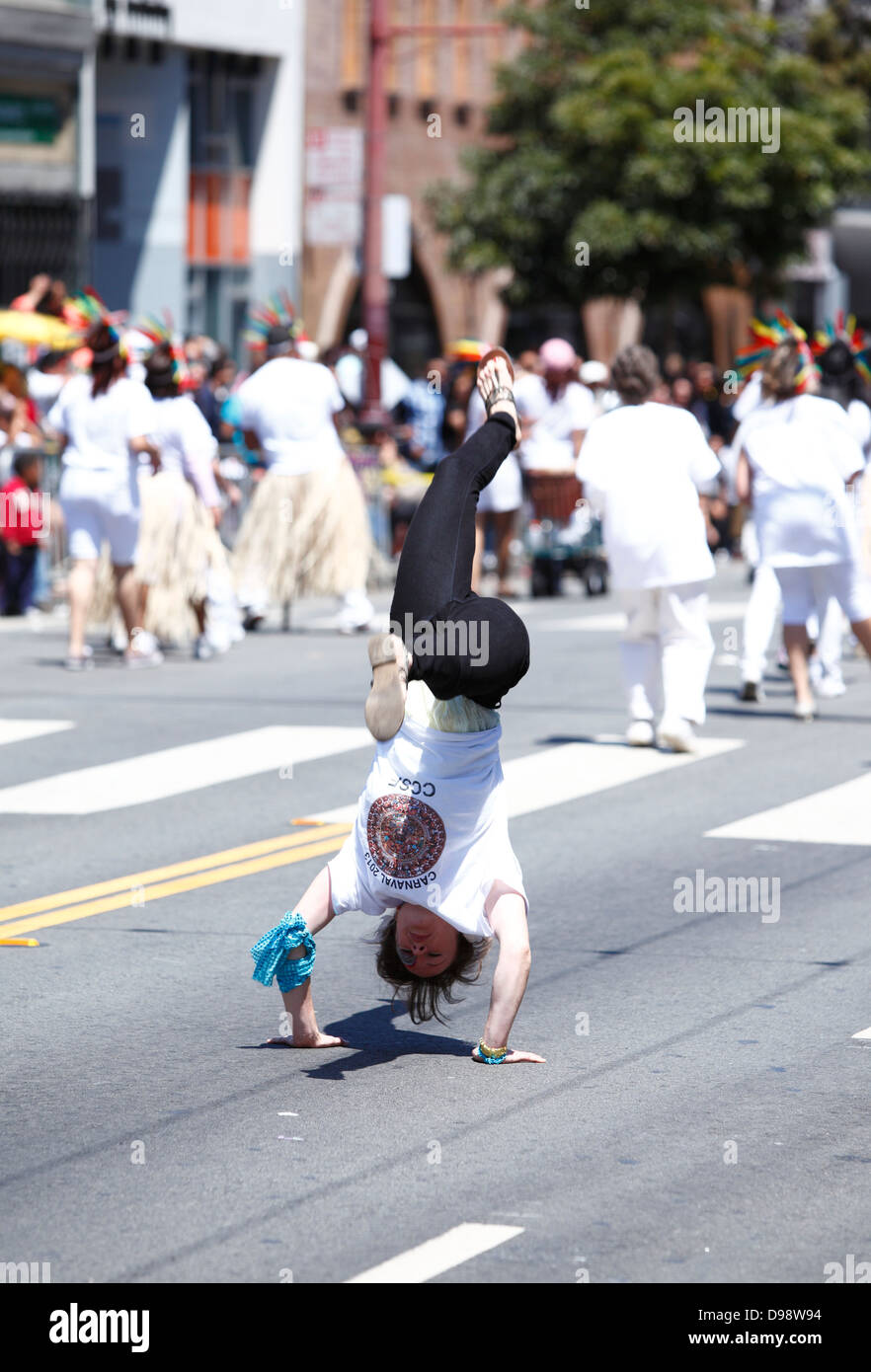 Acrobatic dancers during carnaval parade in Mission District, San Francisco, California, USA Stock Photo