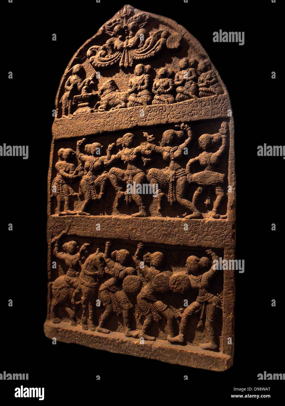 Commemorative stele ('Stone of heroes'). 14th century, 15th century, Vijayanagara dynasty (15th-16th century AD) basalt sculpture  India, Karnataka Stock Photo