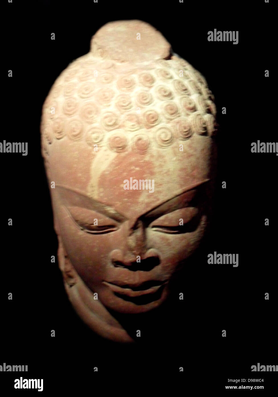 Head of Buddha. Gupta dynasty (320-600 A.D). Sandstone carving from northern India, Mathura (city) Uttar Pradesh Stock Photo