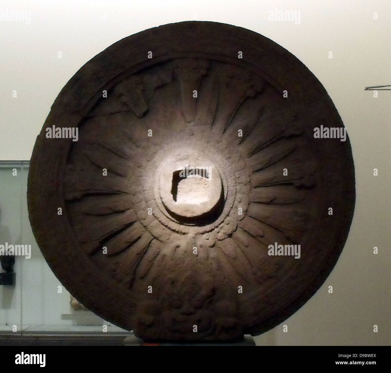Wheel of Law 'dharmacakra. Wheel symbolizing the doctrine in Buddhism. it refers to the first prediction of the Buddha in the Deer Park of Sarnath, near Varanasi. 8th century, 9th century stone sculpture from Phra Pathom Temple, Thailand Stock Photo