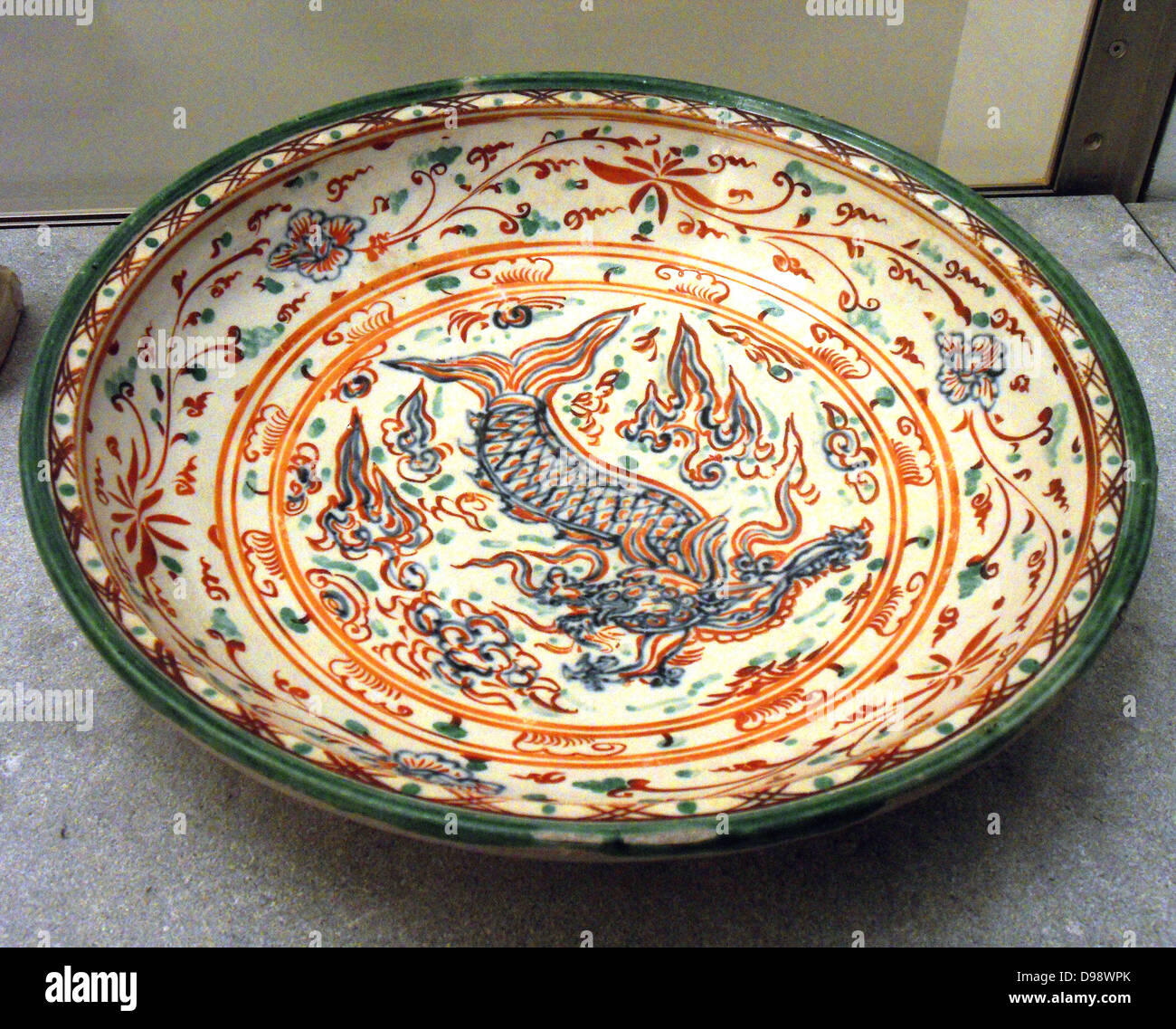 Vietnamese Grand circular plate, decorated with a Feiyu (dragon-fish),  chrysanthemums. 16th century, Later The Dynasty (1428-1789) stoneware  (ceramic), With decoration Stock Photo - Alamy