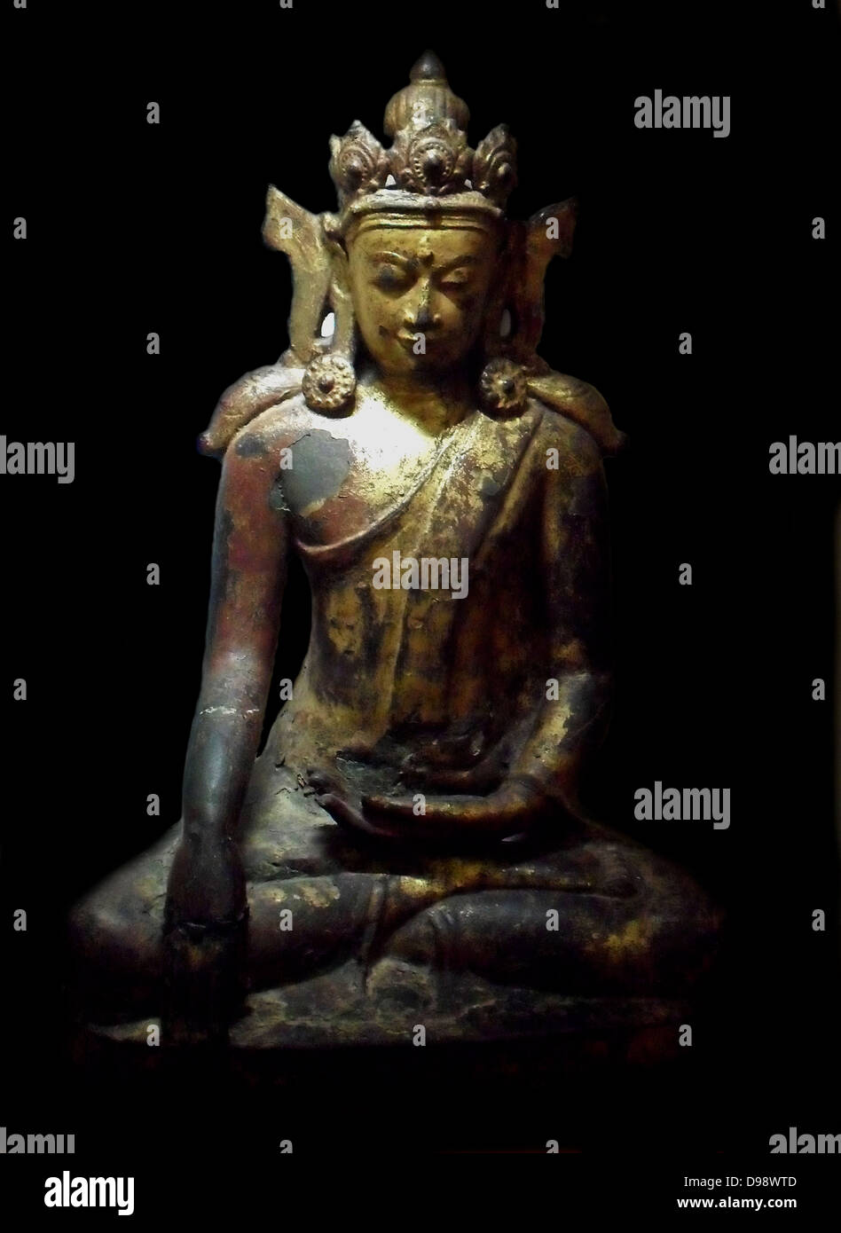 Buddha Maravijaya Pare. Burmese (Myanmar) XV-XVI century Bronze Gilded and painted Stock Photo