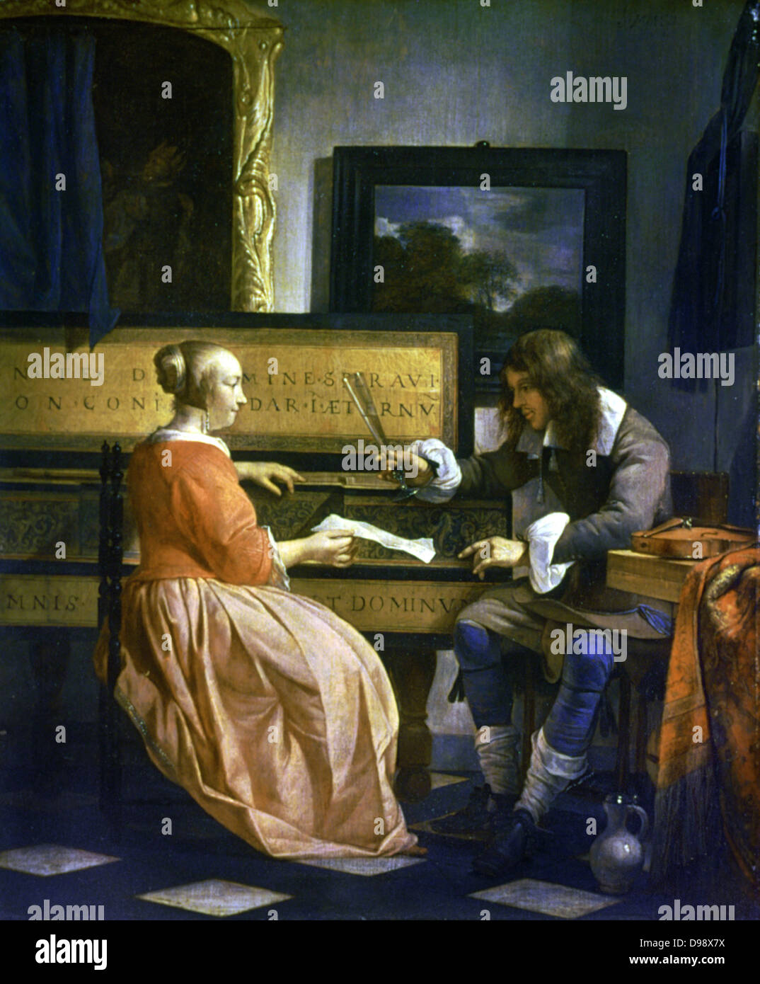 A Man and a Woman'. Gabriel Metsu (1629-1667) Dutch painter. Dutch interior with young man and woman by a virginal. He holds a glass in his hand. On table, right, is an instrument of the violin family. Stock Photo