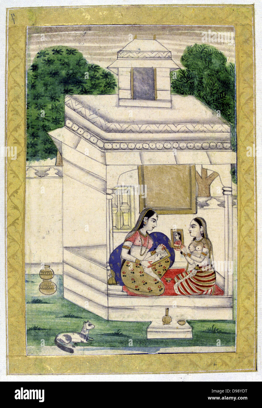 Album of Ragamala. Young woman with a portait of her absent lover. Servant holds up portrait of her mistress (to be sent to absent lover?). 19th century Indian miniature, Rajasthan School. Stock Photo