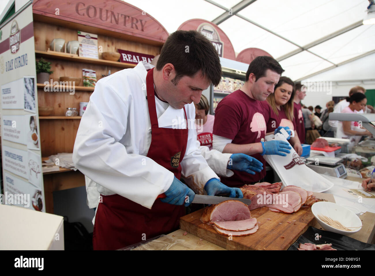 The Brady Family serve home cured ham at Bloom 2013 Dublin Stock Photo