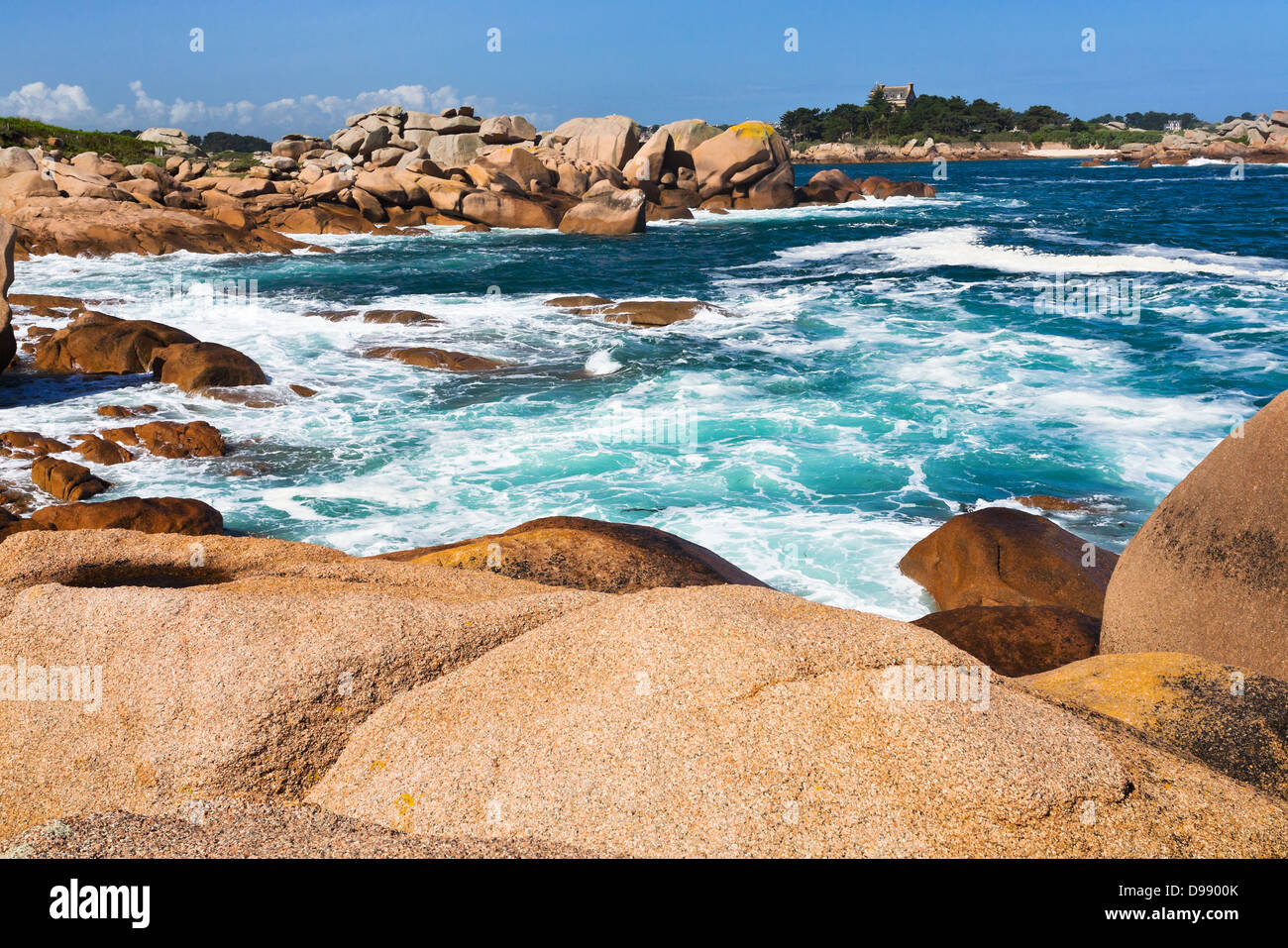 stone Pink Granite Coast in Brittany in sunny day, France Stock Photo