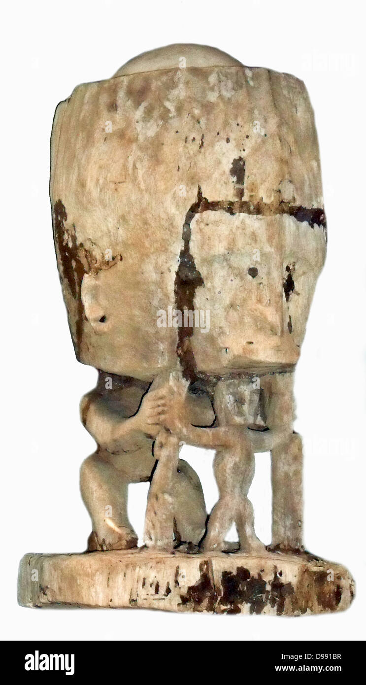 Korwars or ancestral figures. These appear accross Papua New Guinea and are used to recall the memories of the dead. They sometimes include a human skull as a key element.early 20th century Stock Photo