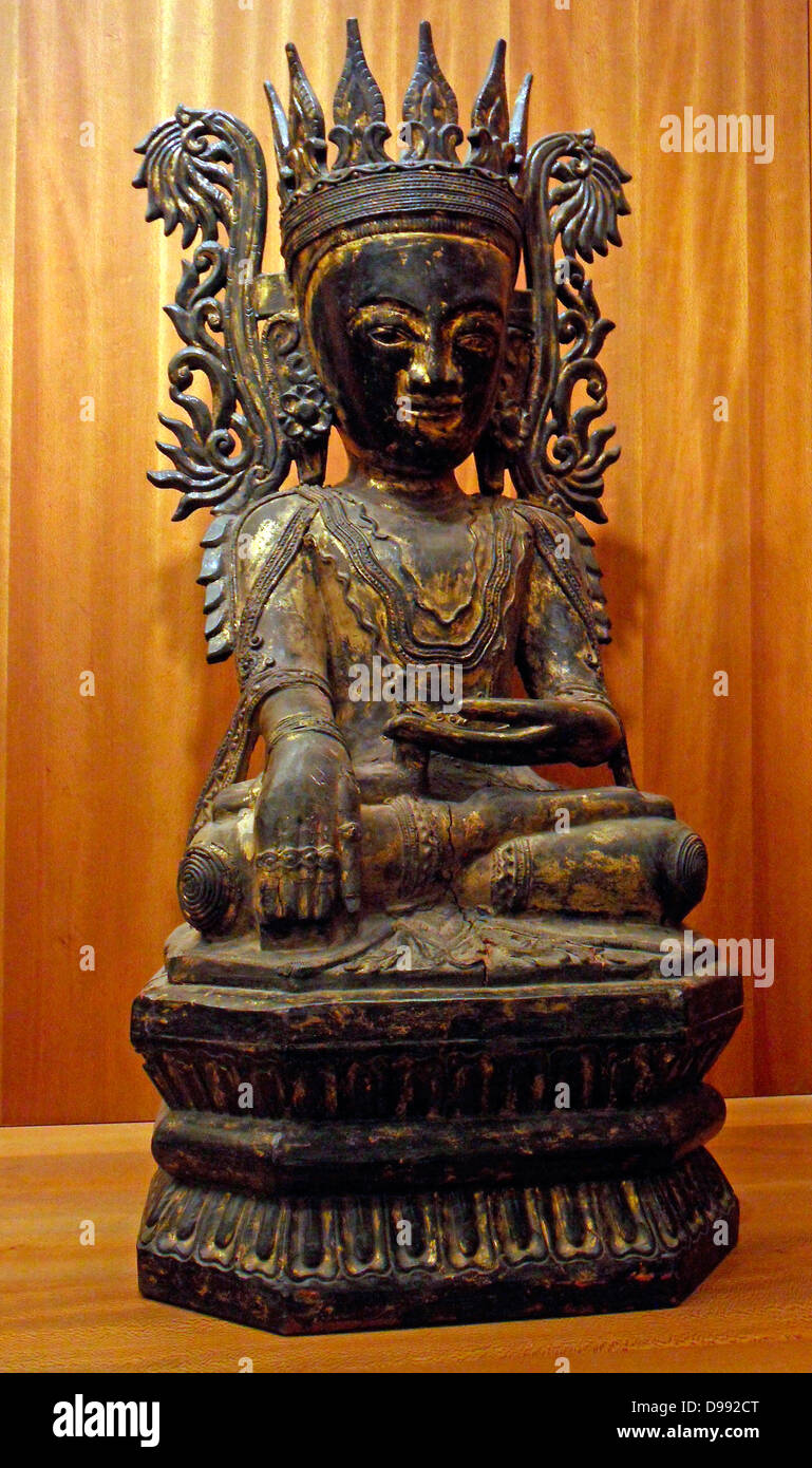 Buddha Maravijaya trimmed. Qualifier winner of the Buddha by the demon of temptation and death, Mara, and managed to attain enlightenment. 18th century, 19th century lacquered sculpture from Myanmar Stock Photo
