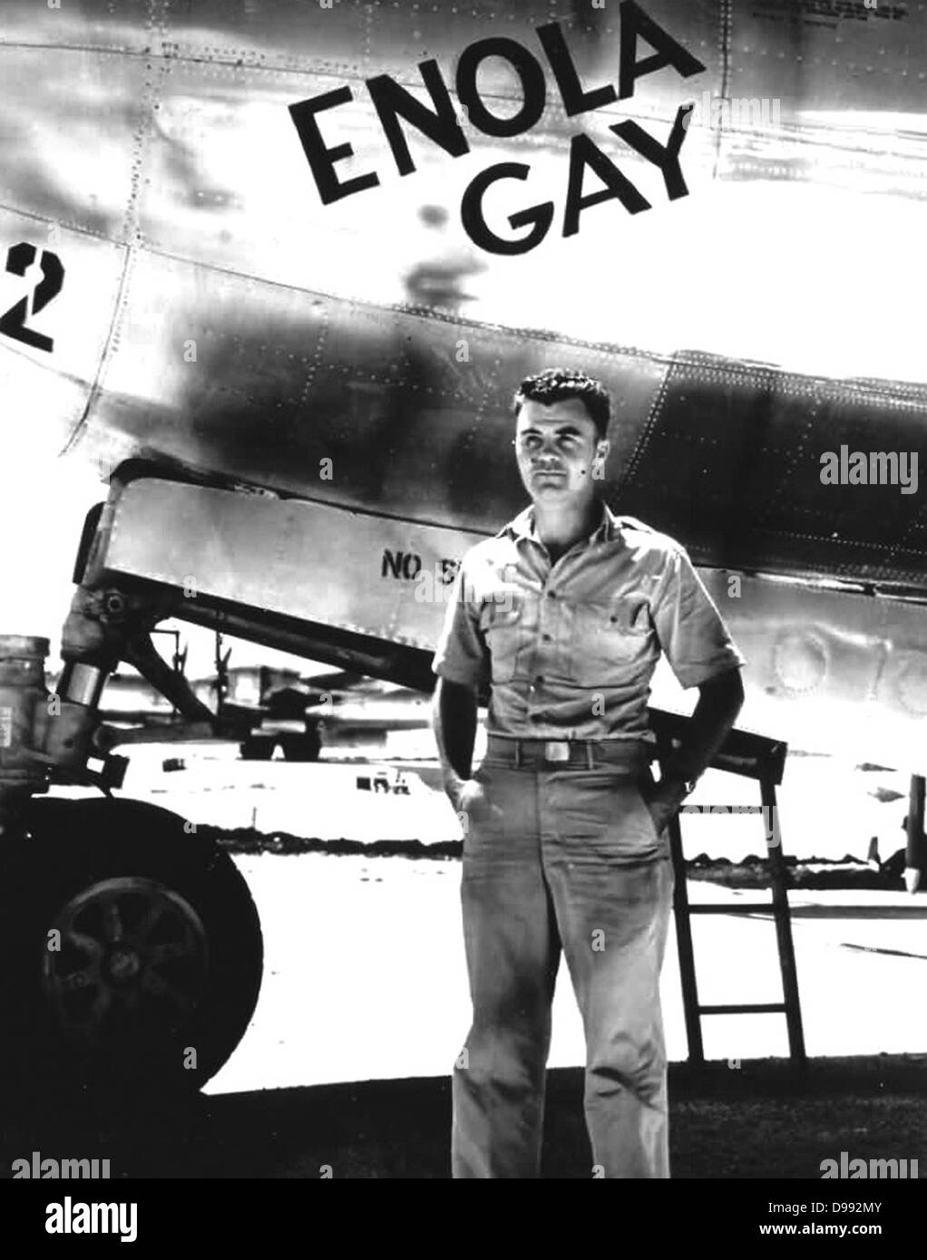 World War II: Paul Tibbets standing in front of the B-29 Enola Gay, the plane he piloted to Hiroshima and dropped the world’s first atomic bomb on 5 August 1945. Warfare Aerial Nuclear Stock Photo