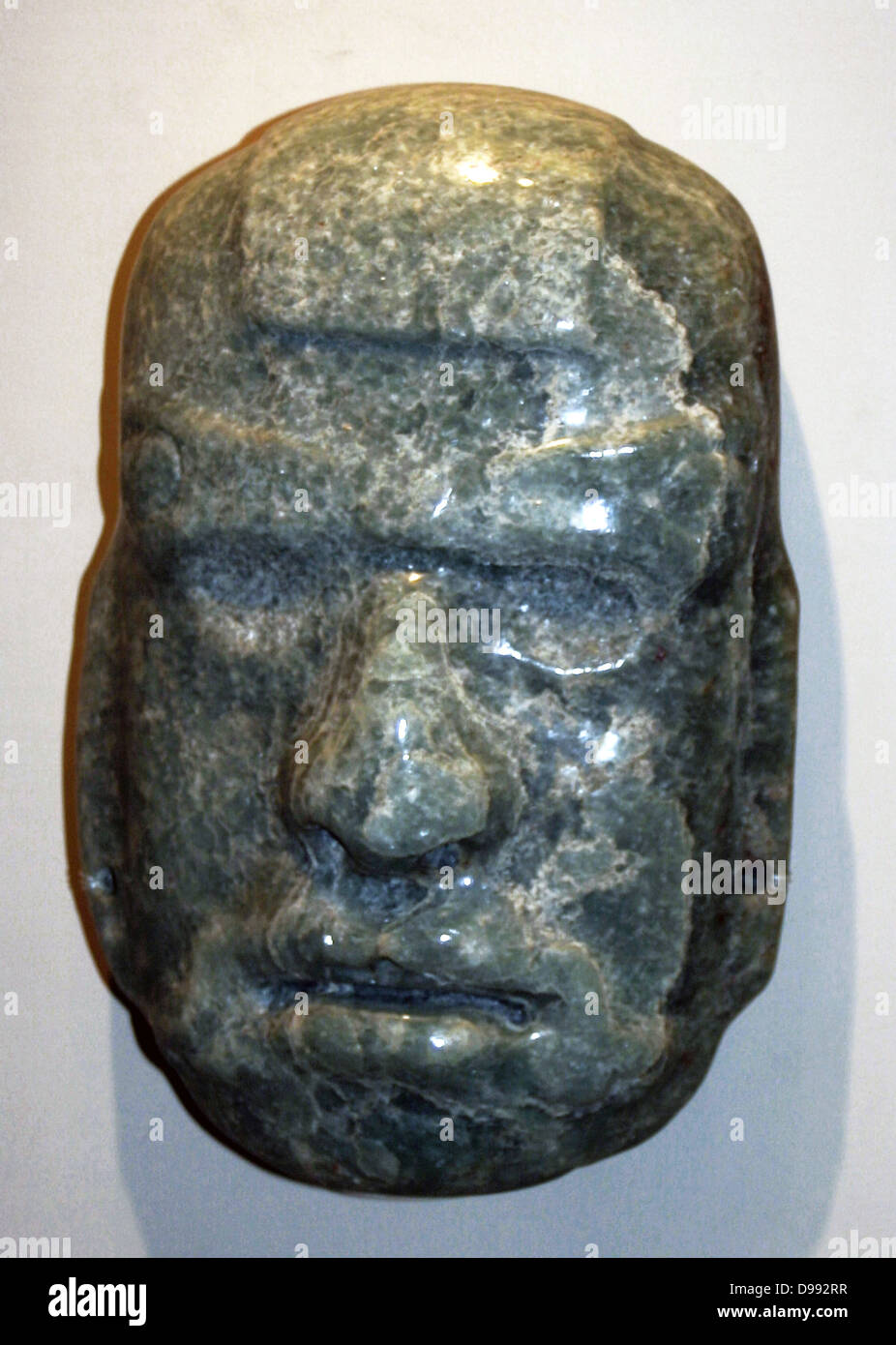 Jade mask of an anthropomorphic god, Mayan AD 50-300. Pre-Columbian Mesoamerican Stock Photo