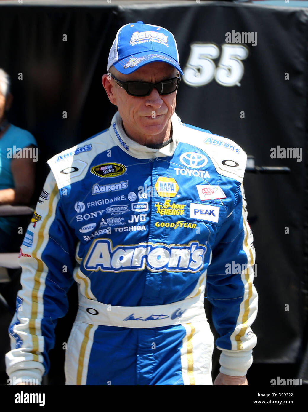 Brooklyn, Michigan, USA. 14th June 2013. Sprint Cup Series driver Mark Martin (55) walks to the garage during practice at the Nascar Sprint Cup Series at Michigan International Speedway on June 14, 2013 in Brooklyn, Michigan. Tom Turrill/CSM/Alamy Live News Stock Photo