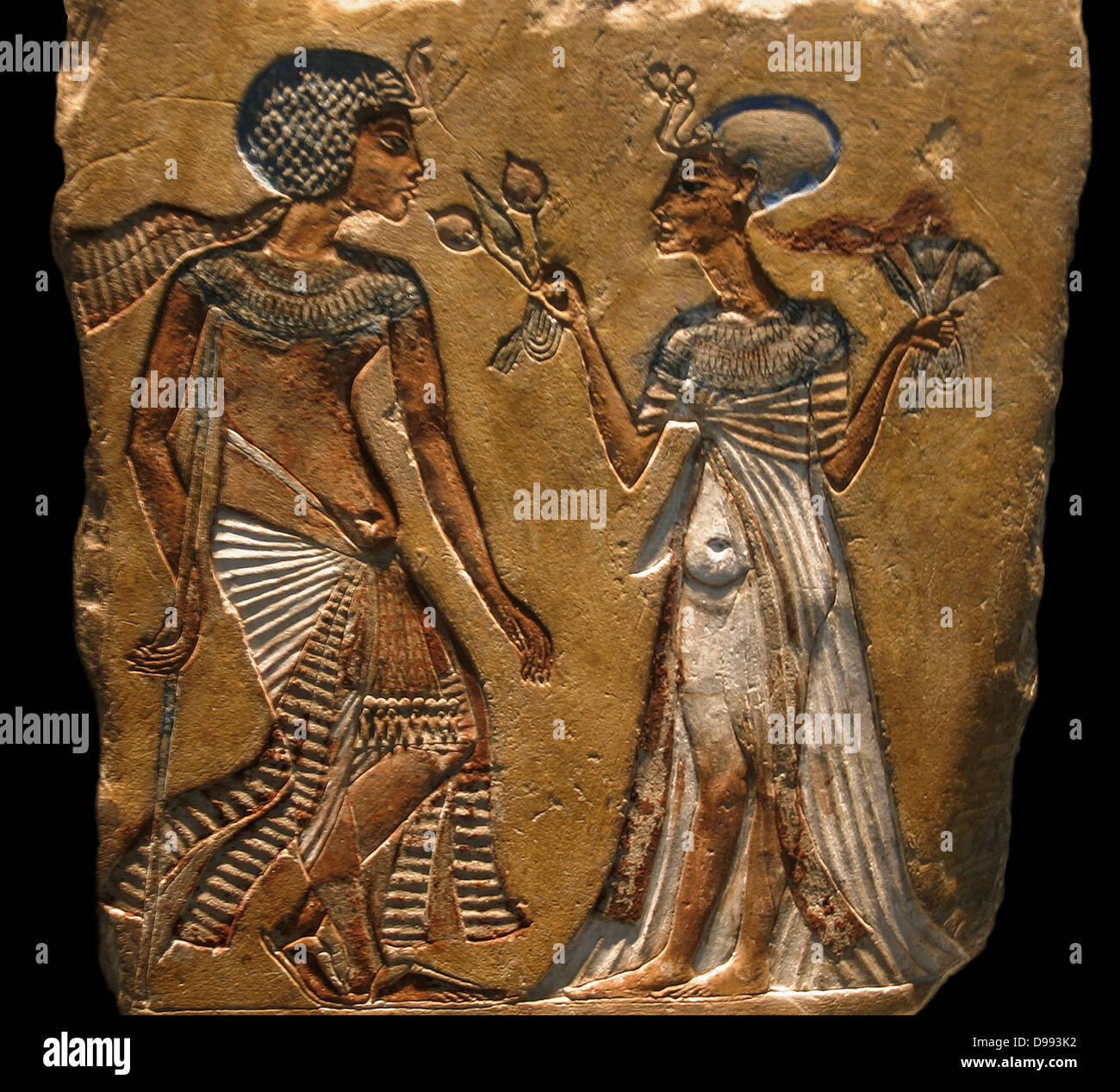 Ancient Egyptian painted relief.' Walk in the garden'. 18th Dynasty, C. 1335 B.C. From Amarna. shows Tutankhamen with an injury of the left leg. Pharaoh of Egypt. Reign; 1391–1353 or 1388–1351 BC, 18th Dynasty Stock Photo