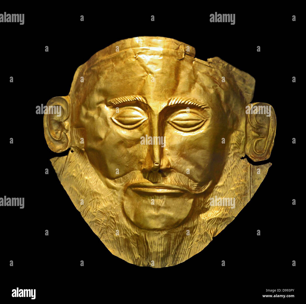 The Mask of Agamemnon discovered at Mycenae in 1876 by Heinrich Schliemann. The mask is a gold funeral mask, found over the face of a body located in a burial shaft. Schliemann believed that he had discovered the body of the legendary Greek leader Agamemnon Stock Photo