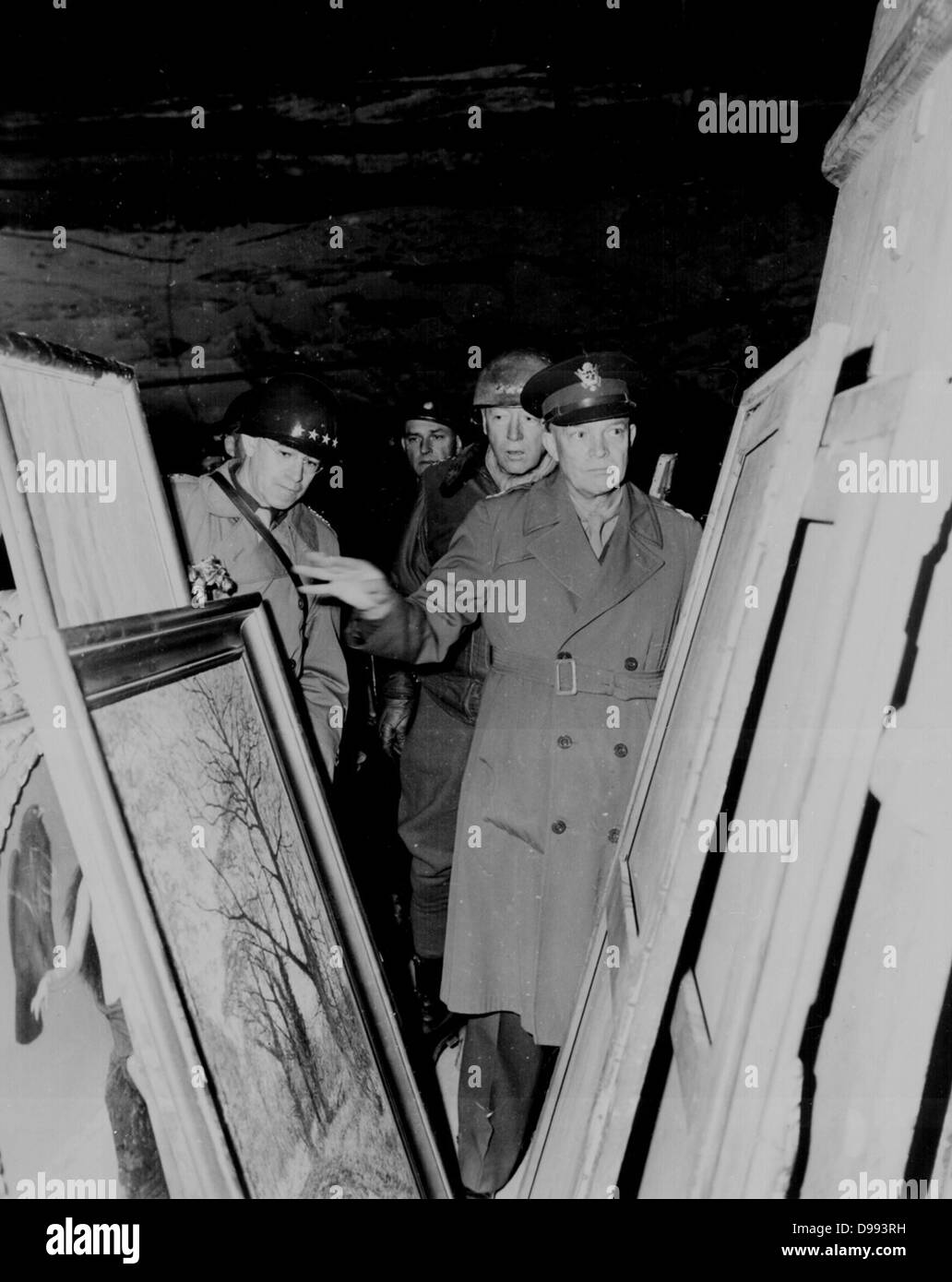 General Dwight Eisenhower viewing confiscated art recovered from the Nazi's after the end of World War II, 1945. Eisenhower, 1890 – 1969 General in the United States Army and the 34th President of the United States, from 1953 until 1961. During World War Stock Photo