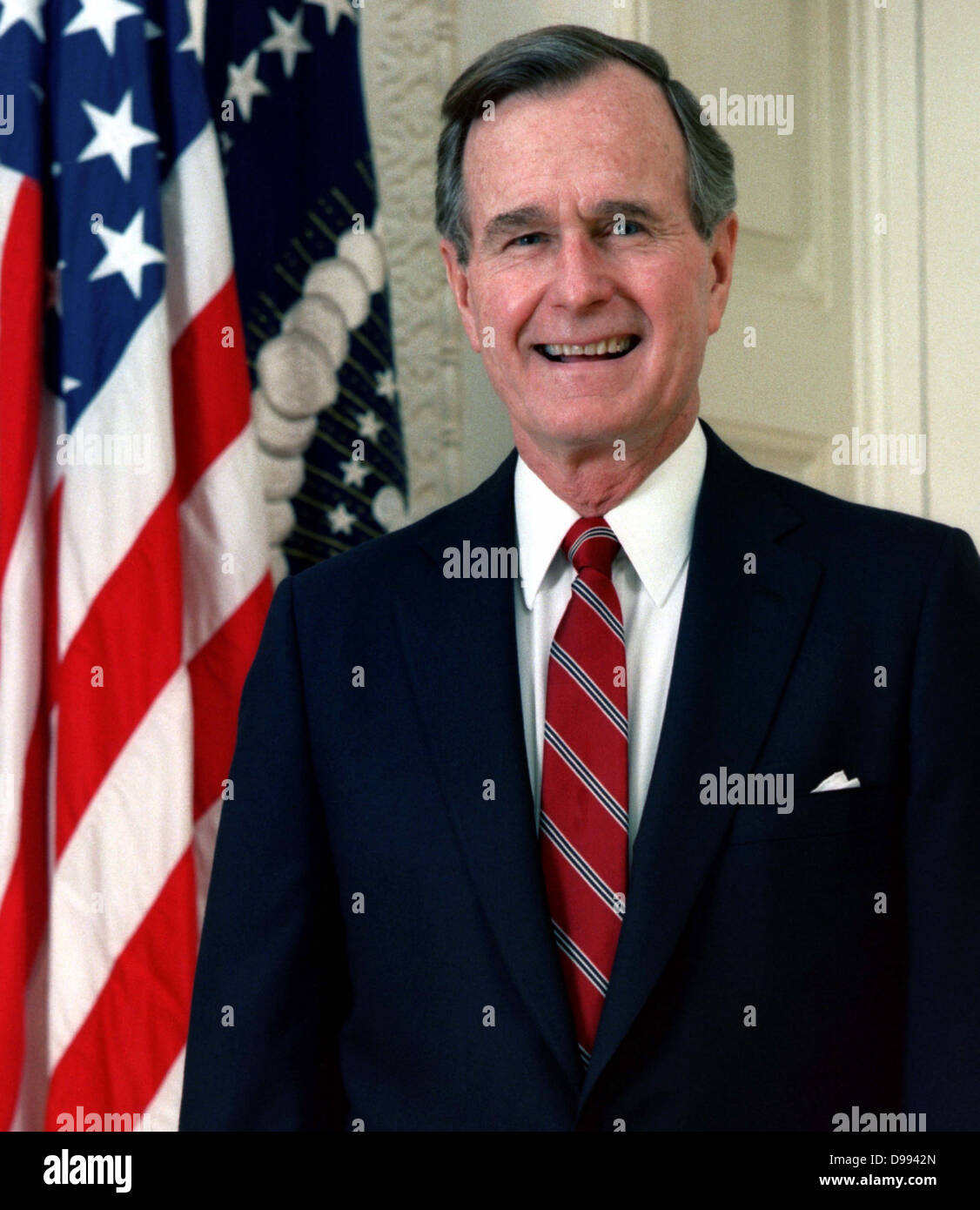 George Herbert Walker Bush (born 1924) 41st President of the United States 1989–1993. Vice President 1981–1989. Head-and-shoulders portrait with stars-and-stripes in background. American Politician Republican Stock Photo